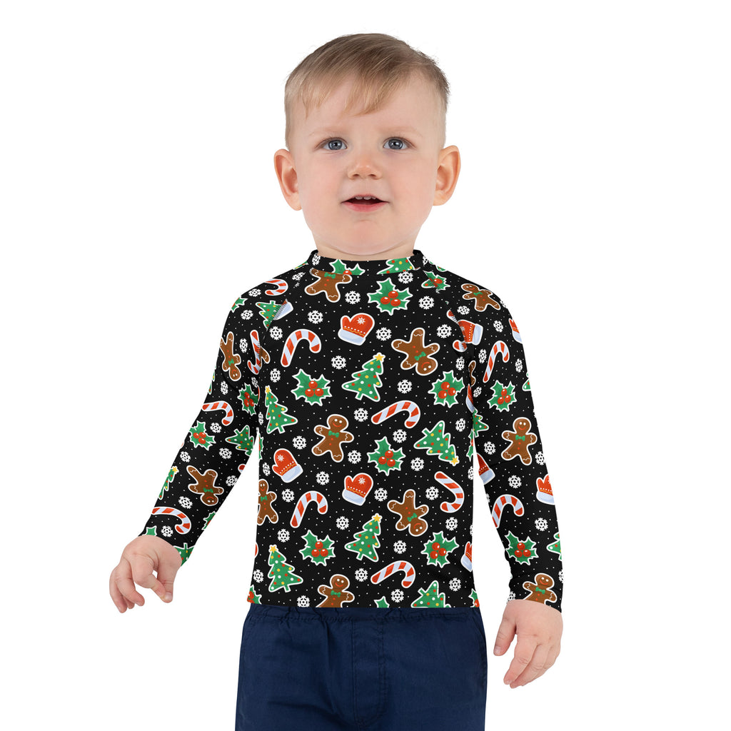 Kids black long sleeve rash guard swim shirt with upf 50+ featuring festive gingerbread men and candy cane pattern