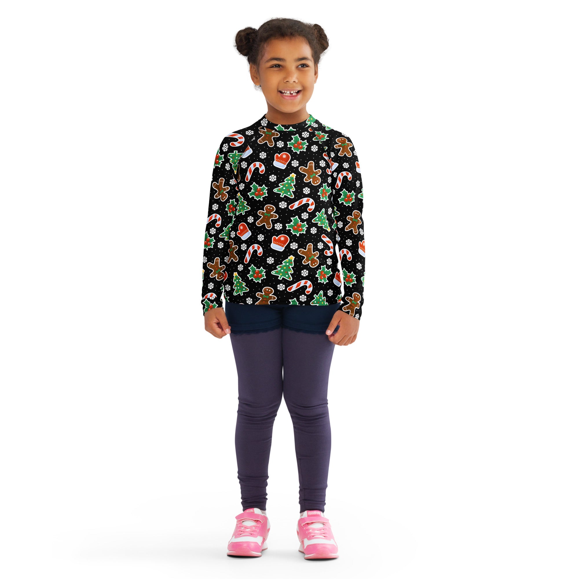 Kids black long sleeve rash guard swim shirt with UPF 50 featuring festive gingerbread men candy canes and green trees