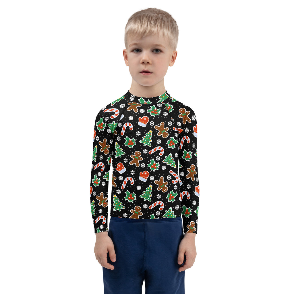 Kids black long sleeve rash guard swim shirt with upf 50 featuring festive gingerbread men candy cane and christmas tree pattern