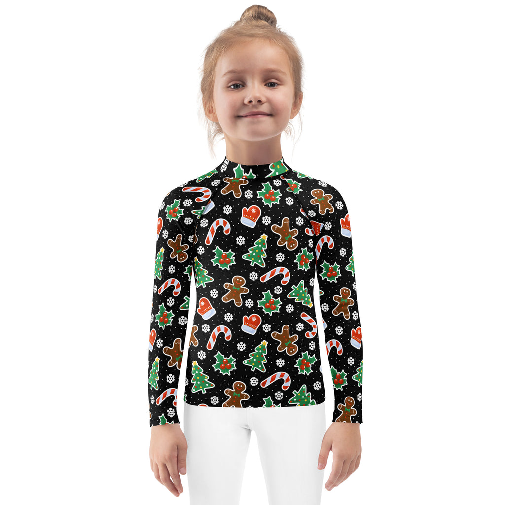 Kids black christmas cookie and candy cane long sleeve rash guard swim shirt with playful festive pattern and UPF 50+ protection