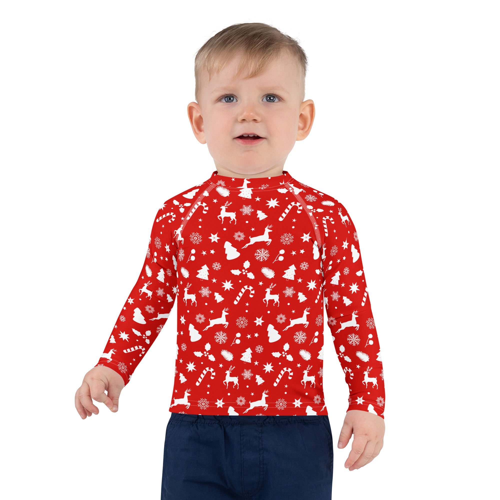 Kids red christmas long sleeve rash guard swim shirt with white holiday patterns and upf 50 plus sun protection