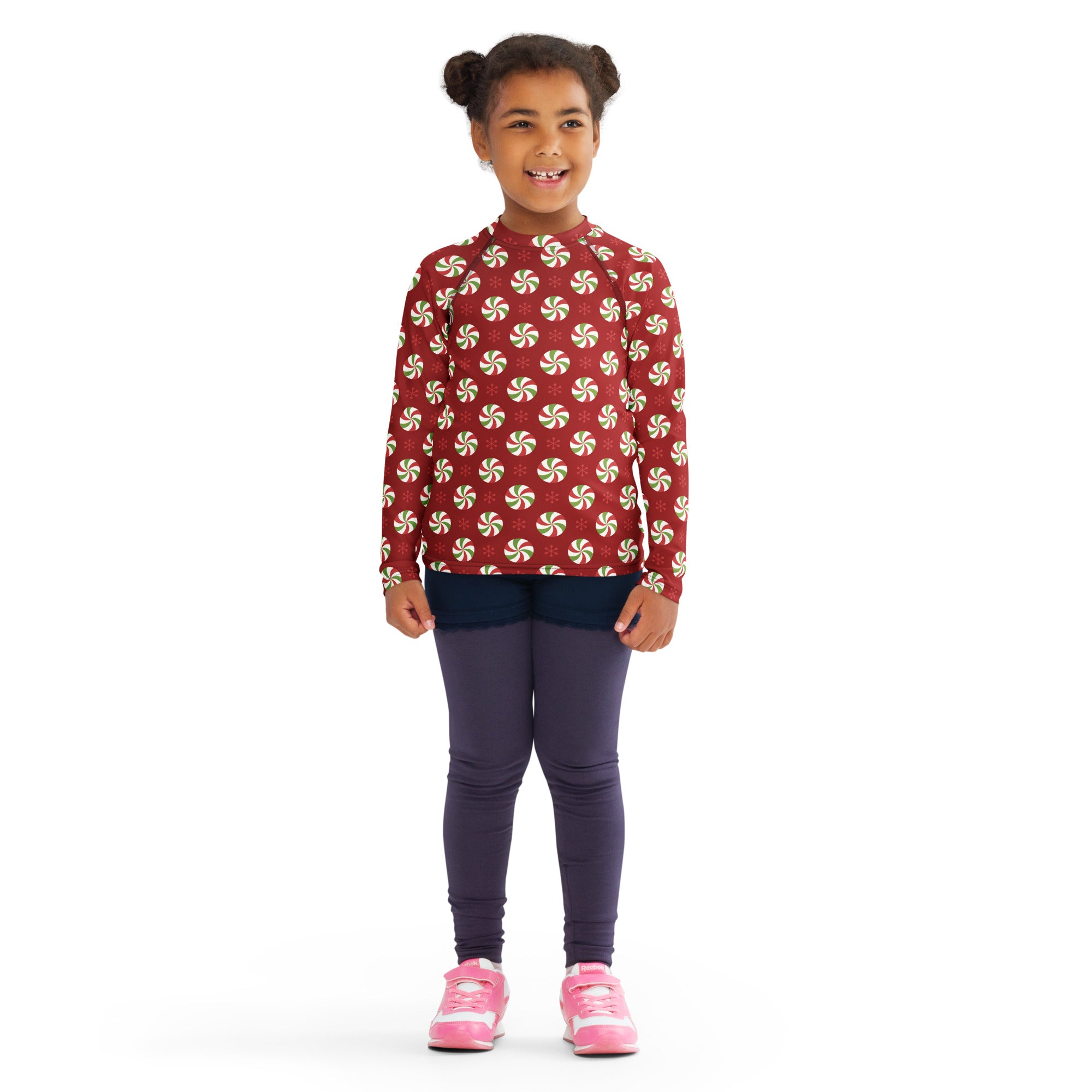 Kids peppermint swirl christmas long sleeve rash guard swim shirt with upf 50 plus red with white and green candy pattern