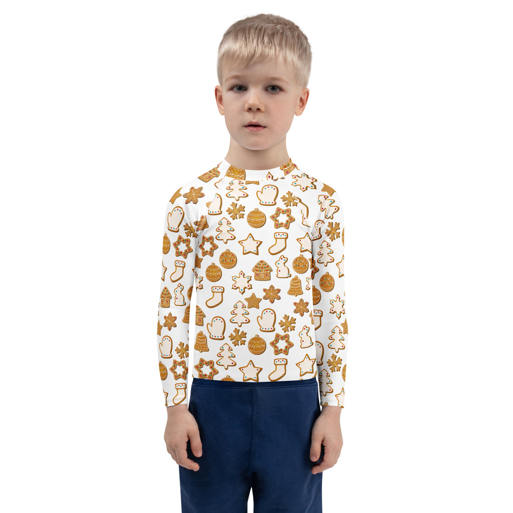 Kids christmas gingerbread cookie long sleeve rash guard swim shirt in white with festive golden brown pattern and upf 50+ protection