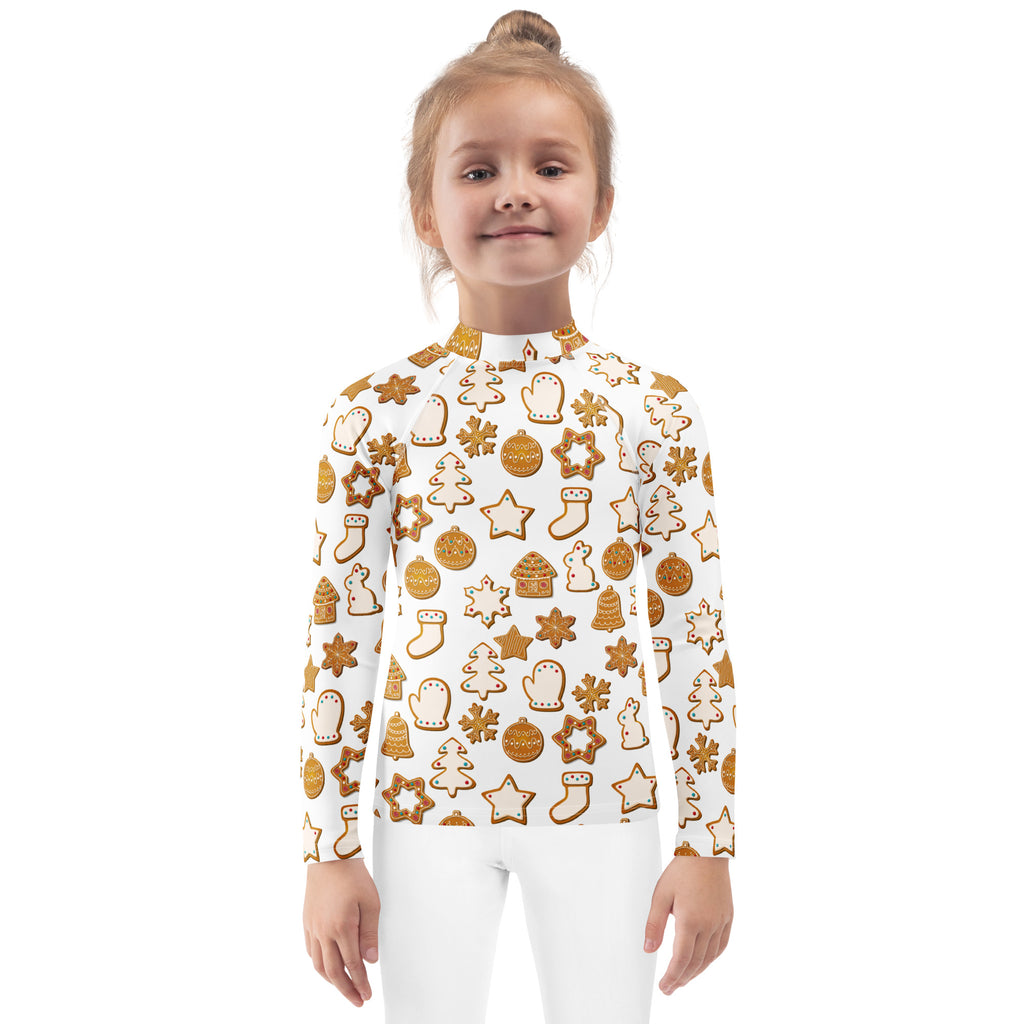 White long-sleeved kids swim shirt with UPF 50 plus featuring festive gingerbread cookie pattern in golden brown and beige