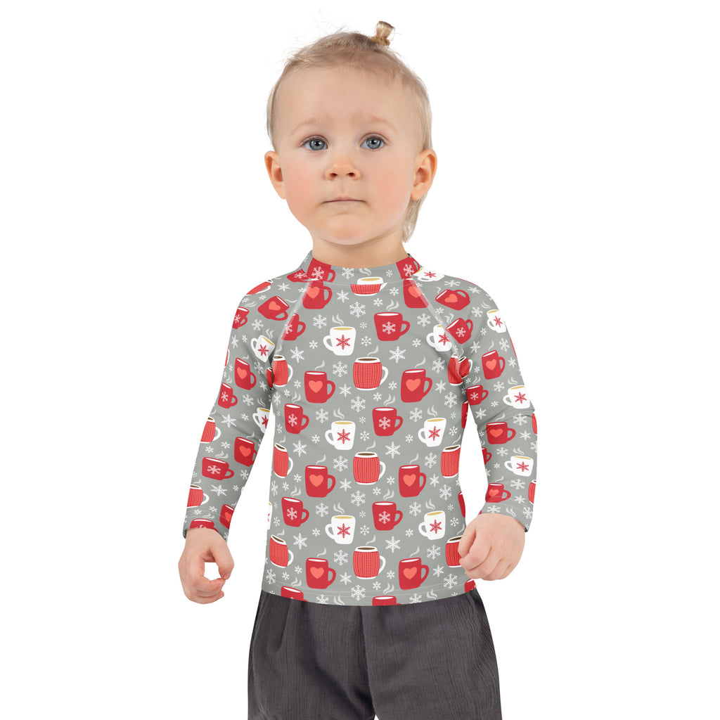 Gray kids long sleeve rash guard with red and white coffee mug snowflake pattern and UPF 50 plus for swim use