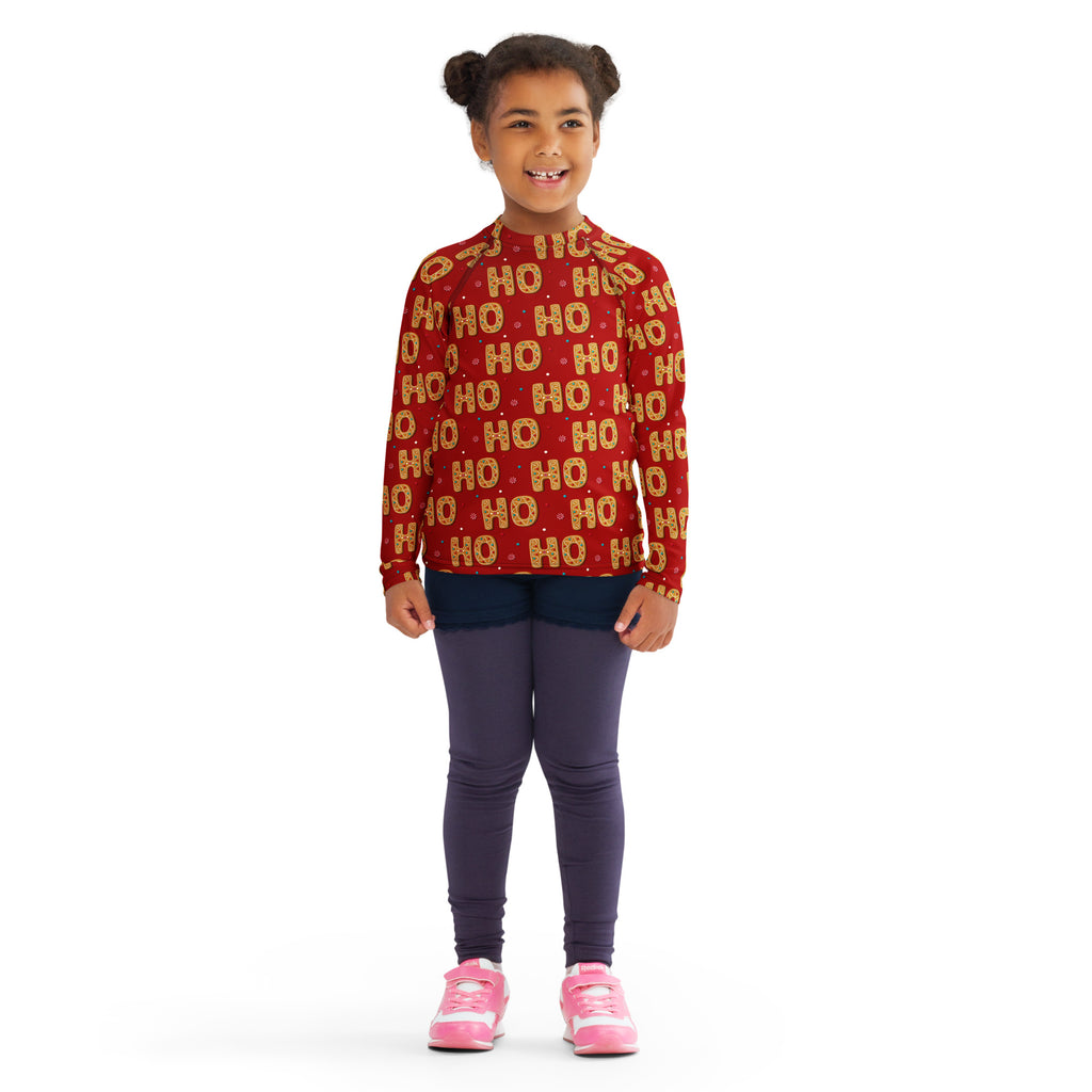 Kids ho ho ho gingerbread christmas long sleeve rash guard swim shirt red with gold lettering and decorative dots