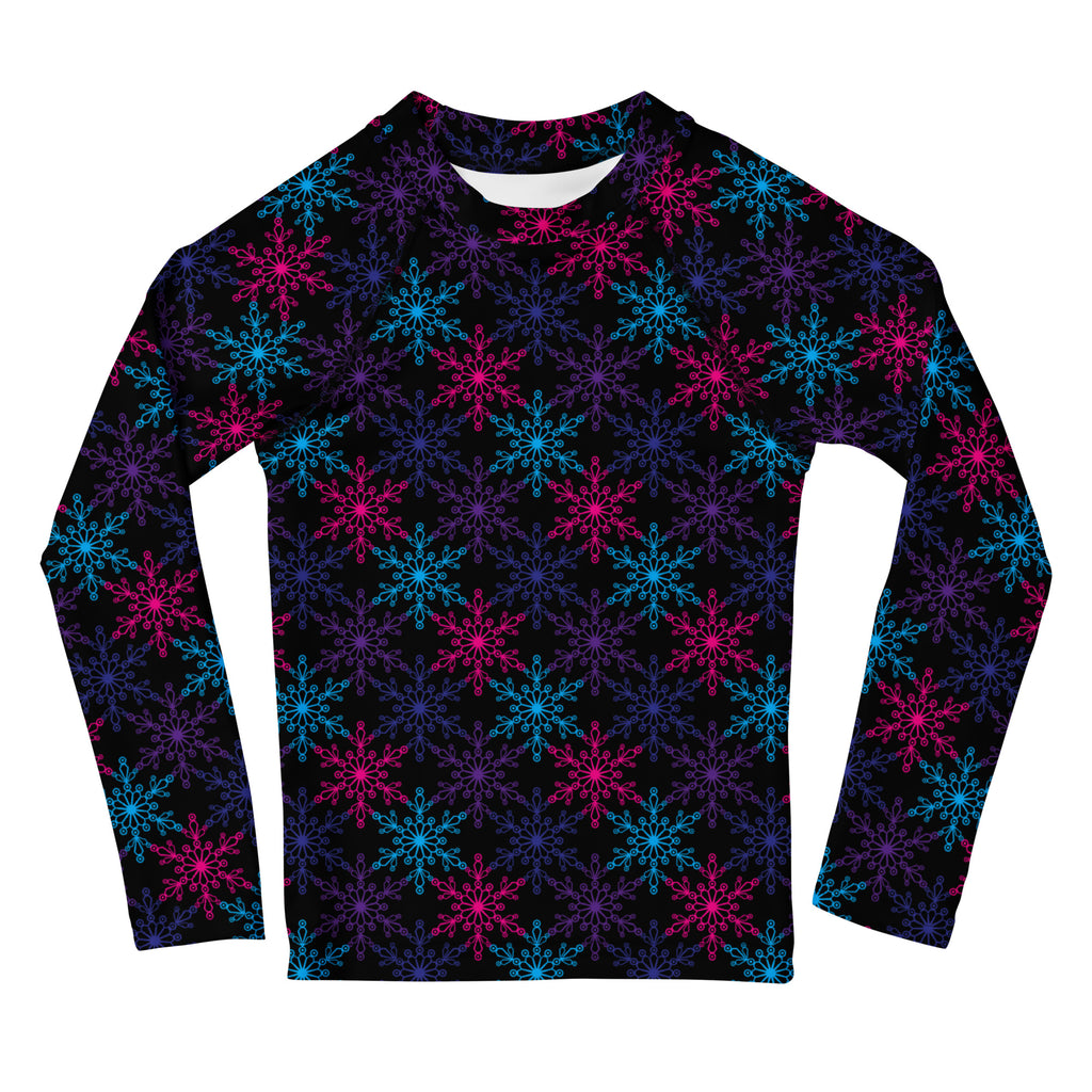 Kids neon snowflakes christmas long sleeve rash guard swim shirt in black with glowing pink and blue snowflake pattern and UPF 50+