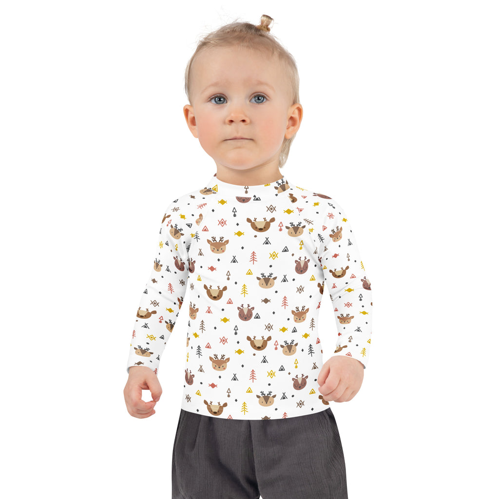 Kids reindeer forest christmas long sleeve rash guard swim shirt in white with playful brown deer and colorful geometric patterns