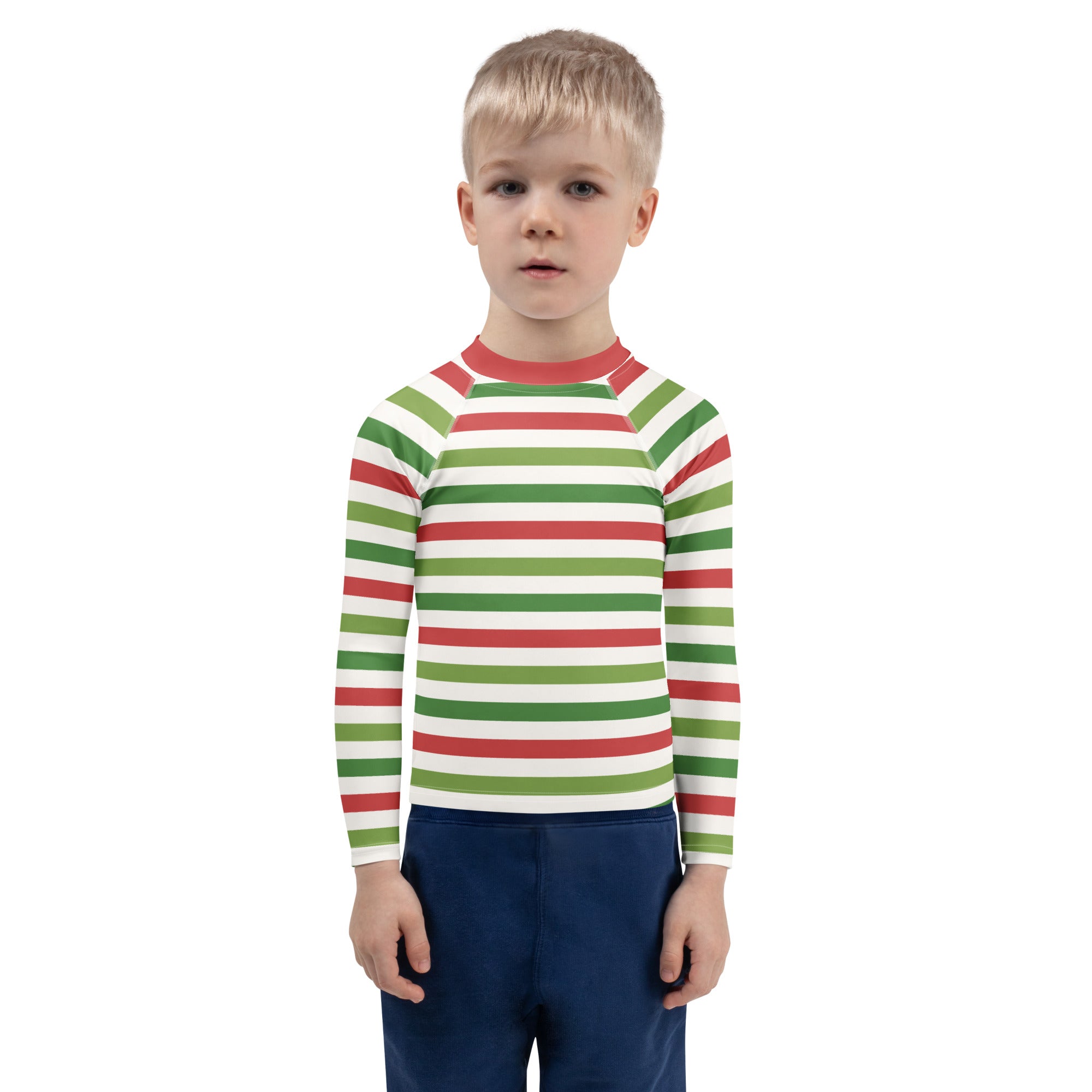 A child wearing a kids red and green christmas stripes long sleeve rash guard swim shirt with upf 50 plus