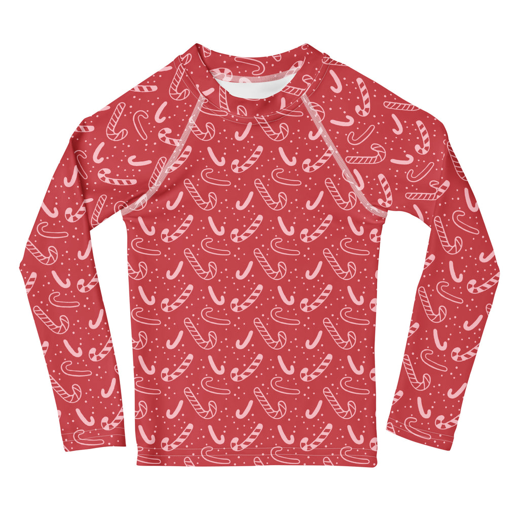 Kids red candy cane long sleeve rash guard swim shirt with white pattern small dots and upf 50 plus protection