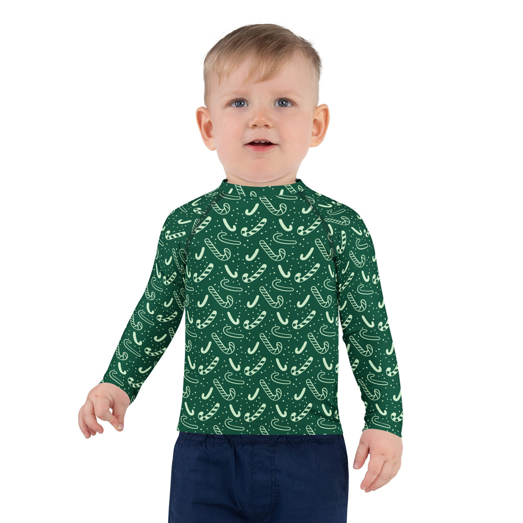 Kids green candy cane christmas long sleeve rash guard swim shirt with upf 50 plus for sun protection