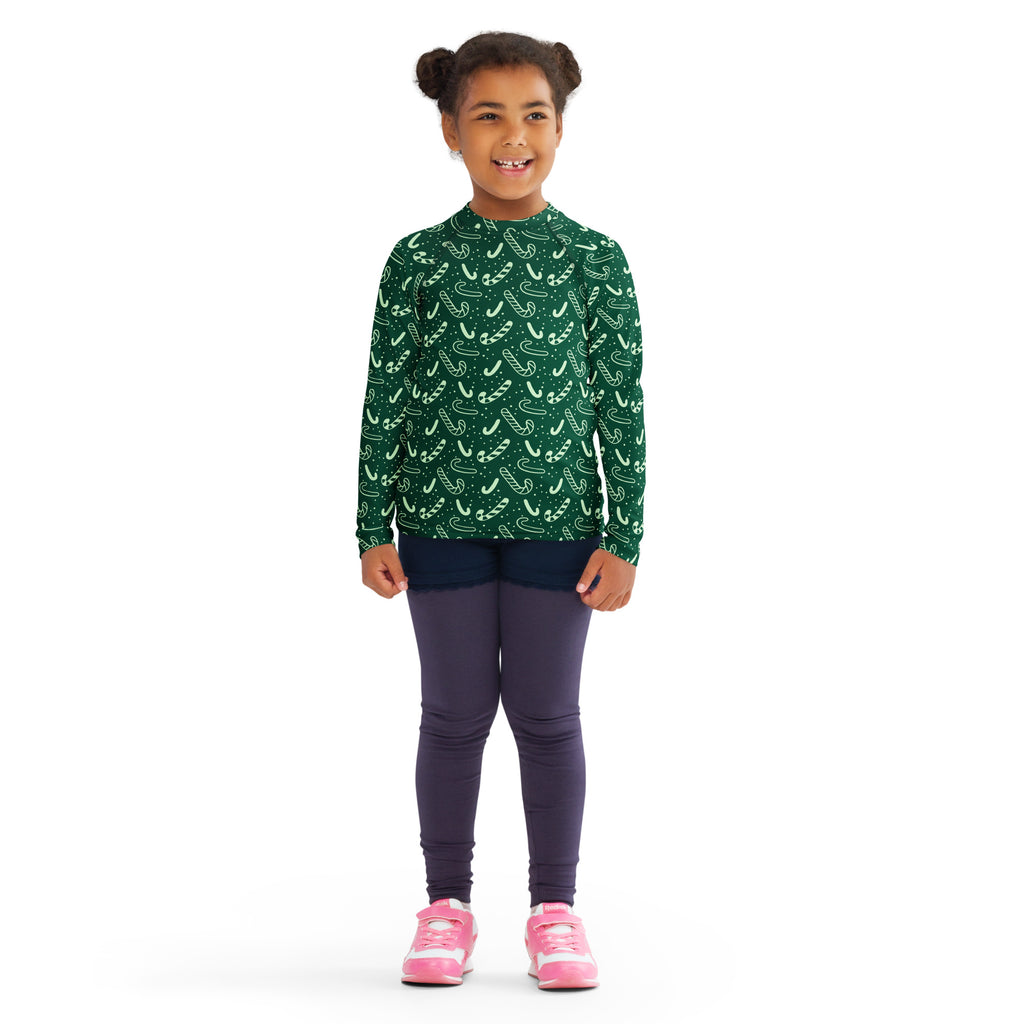 Kids green candy cane christmas long sleeve rash guard swim shirt with upf 50 plus for sun protection