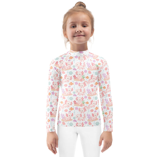 Girls white long sleeve rash guard swim shirt with pink axolotl seashell and coral pattern and UPF 50+ protection