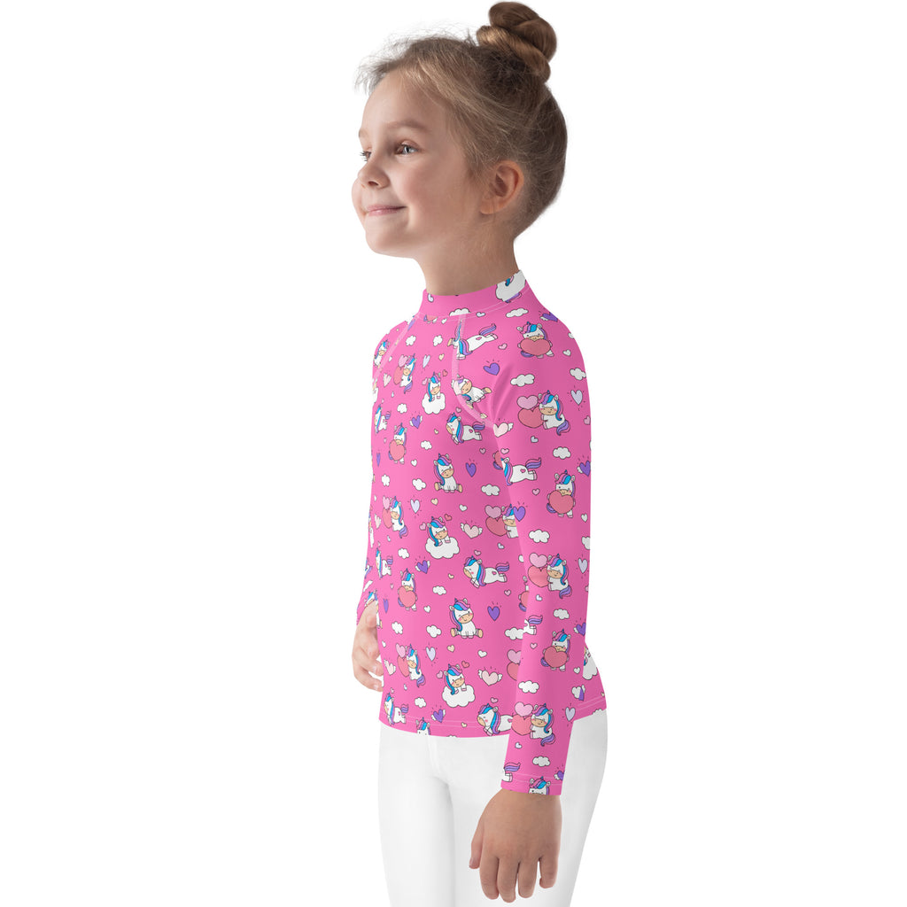 Pink girls long sleeve rash guard swim shirt with unicorn and cloud pattern and upf 50 plus sun protection