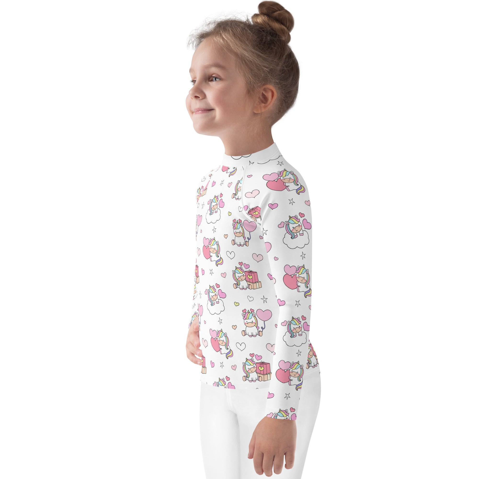White long-sleeved girls unicorn birthday rash guard swim shirt with upf 50 and pink pastel unicorn heart star pattern