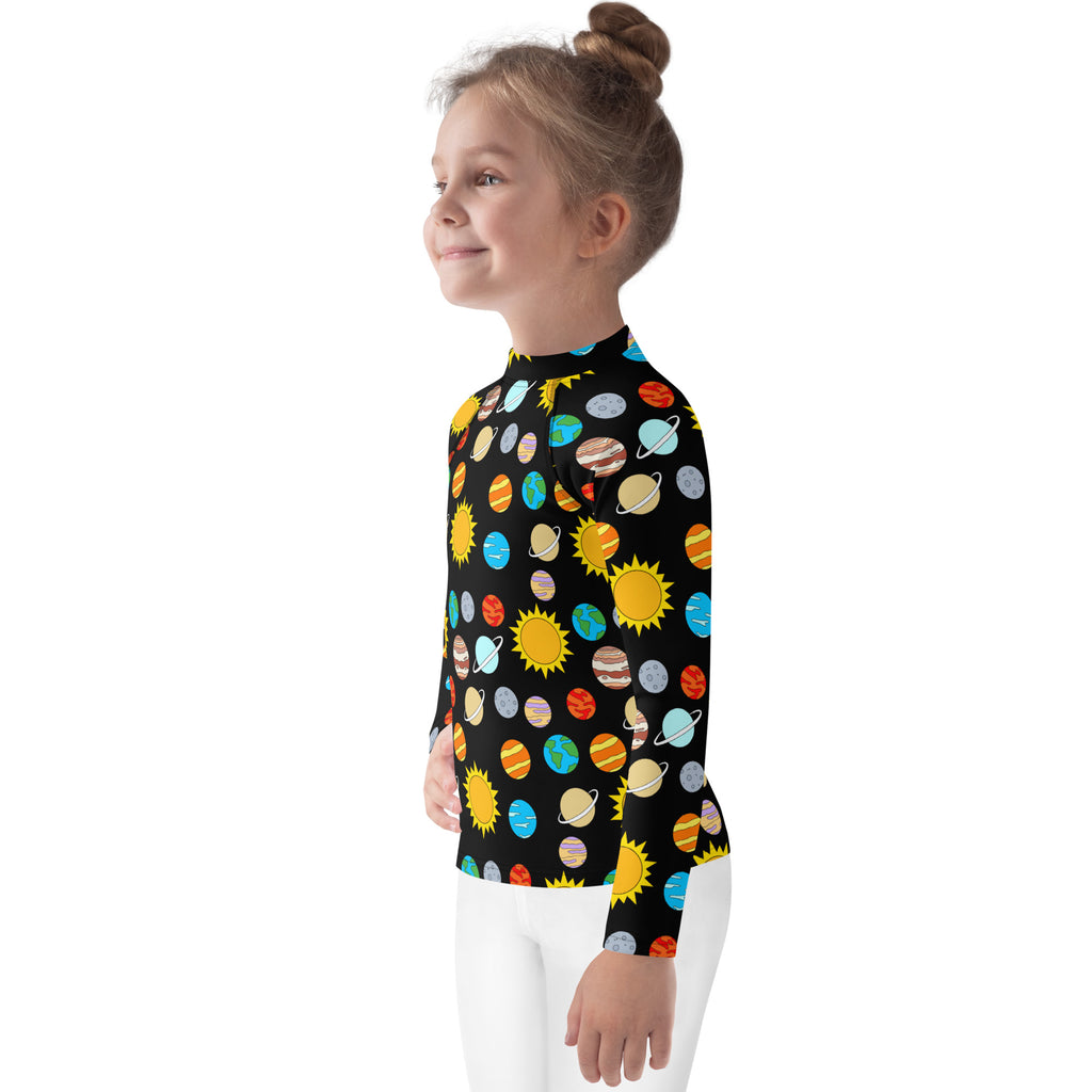 Black long-sleeved kids rash guard swim shirt with vibrant cartoon planets and suns print and UPF 50+ protection