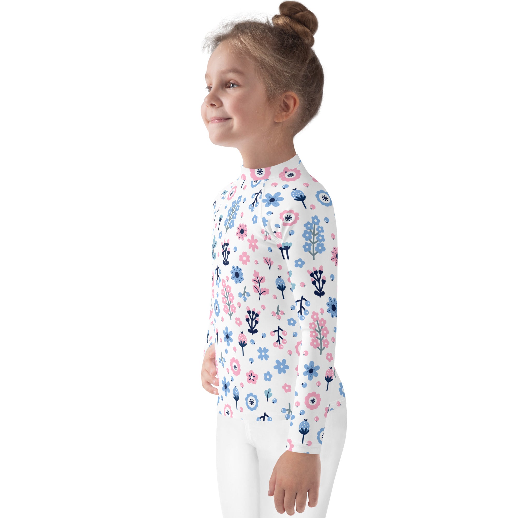 Girls pink and blue floral long sleeve rash guard swim shirt with UPF 50 white fabric and green stems pattern
