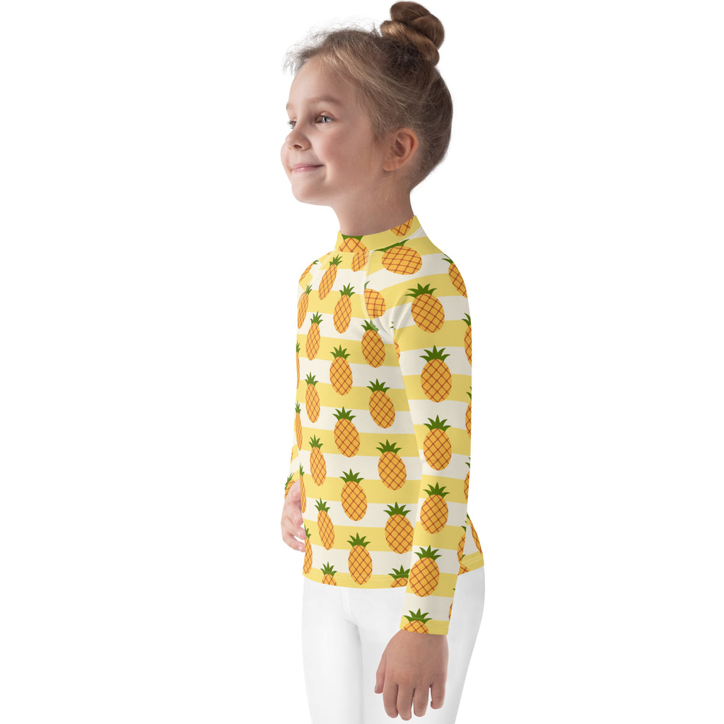 Kids yellow and white long sleeve rash guard swim shirt with pineapple pattern and upf 50 plus sun protection