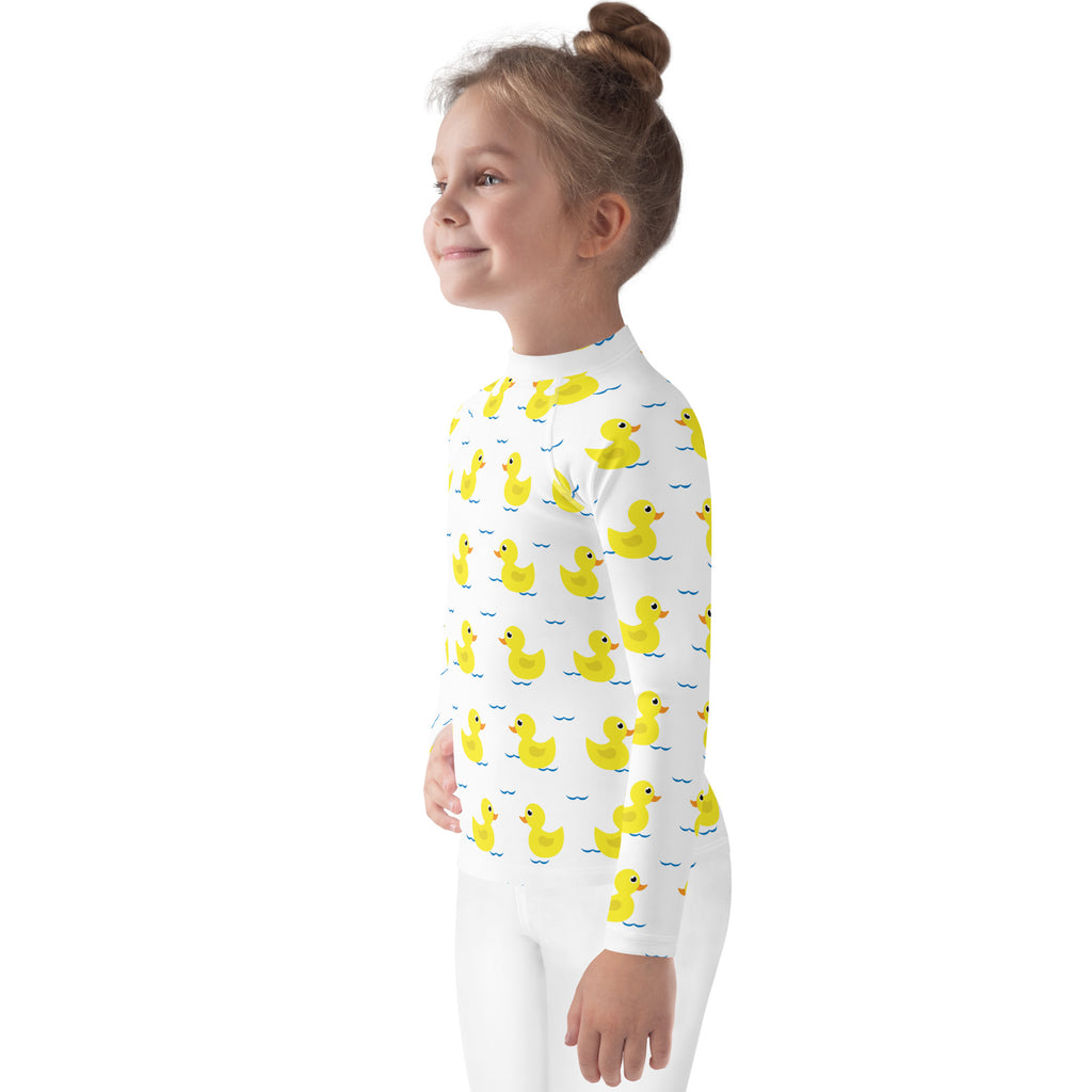 Kids yellow ducks long sleeve rash guard swim shirt in white with yellow duck pattern and upf 50 plus protection