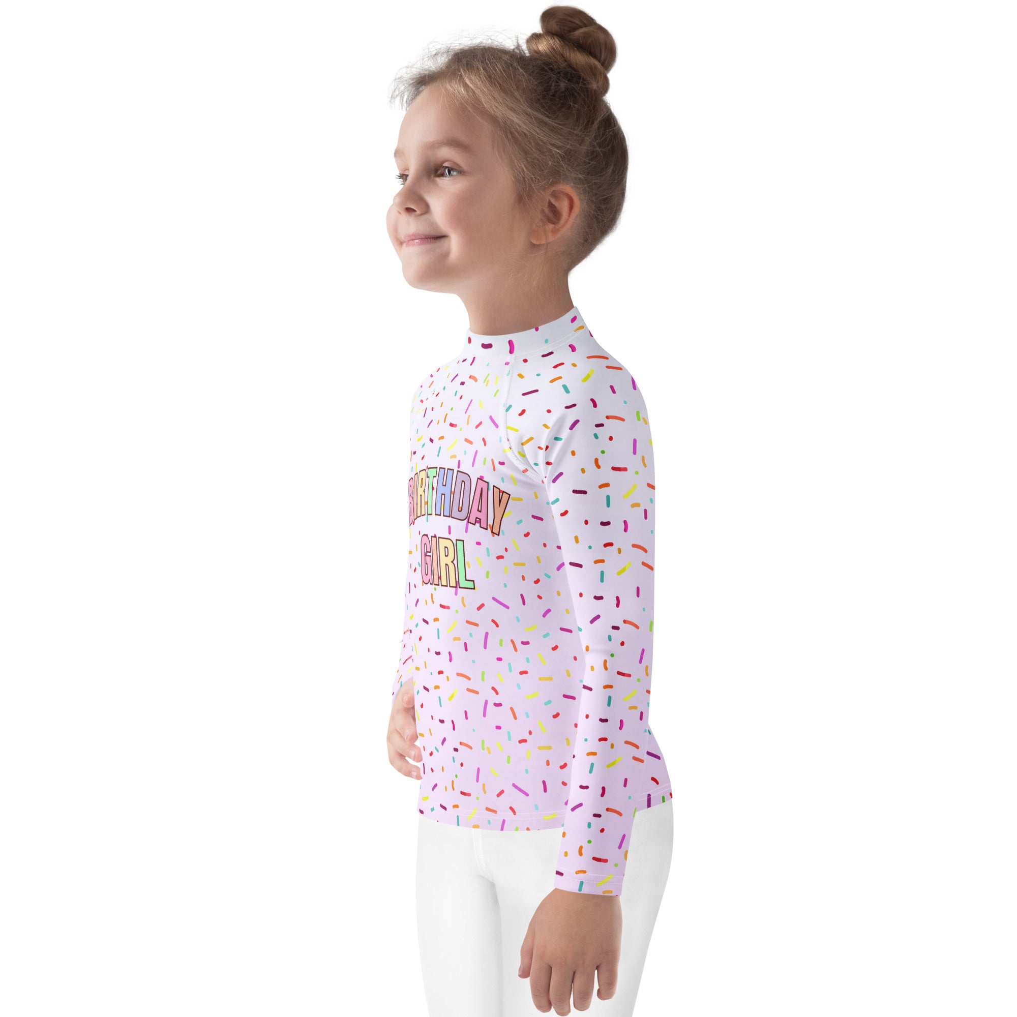 White long sleeve rash guard swim shirt with birthday girl rainbow graphic colorful sprinkle patterns upf 50+