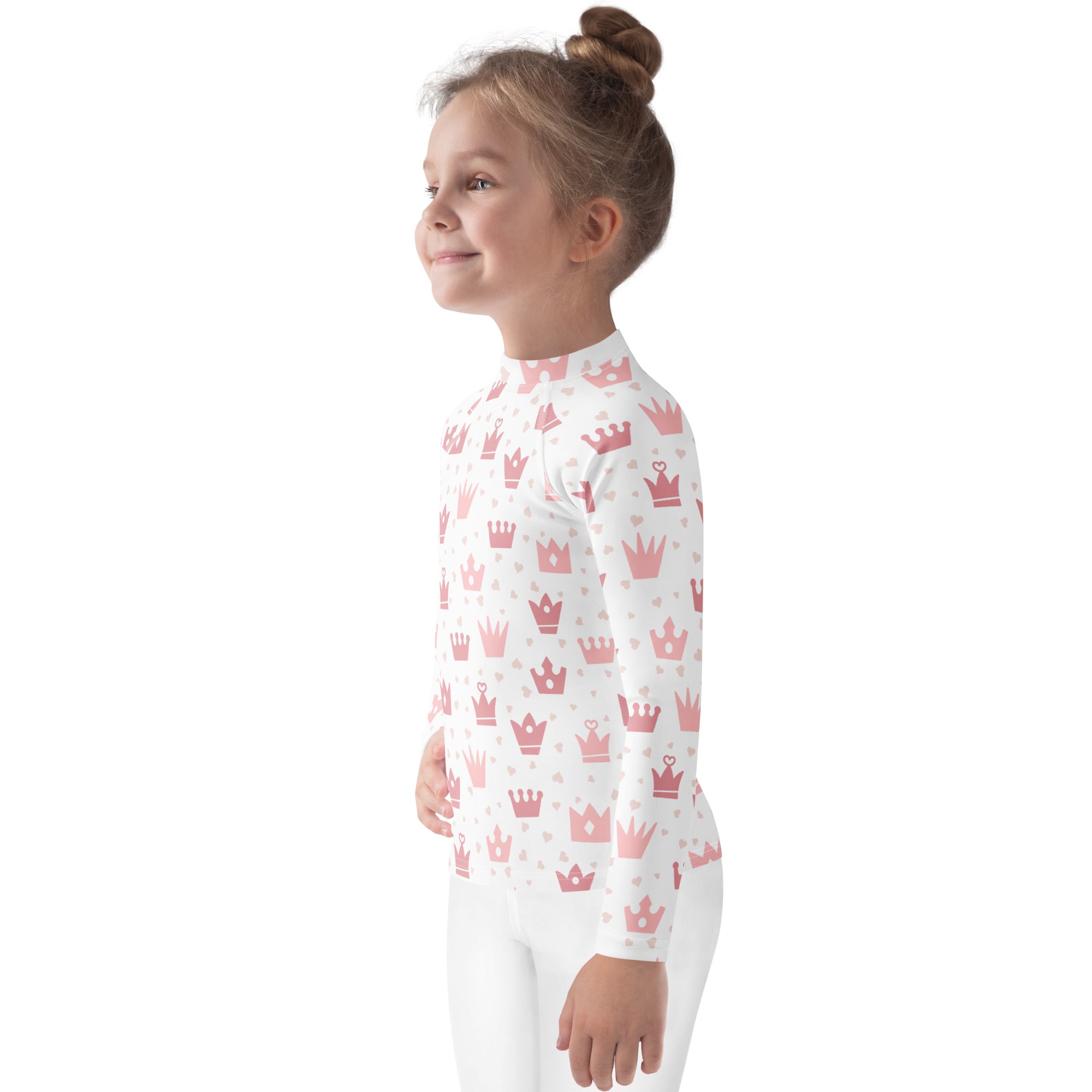 White long-sleeved rash guard for girls with pink princess crowns silver hearts and upf 50 plus sun protection