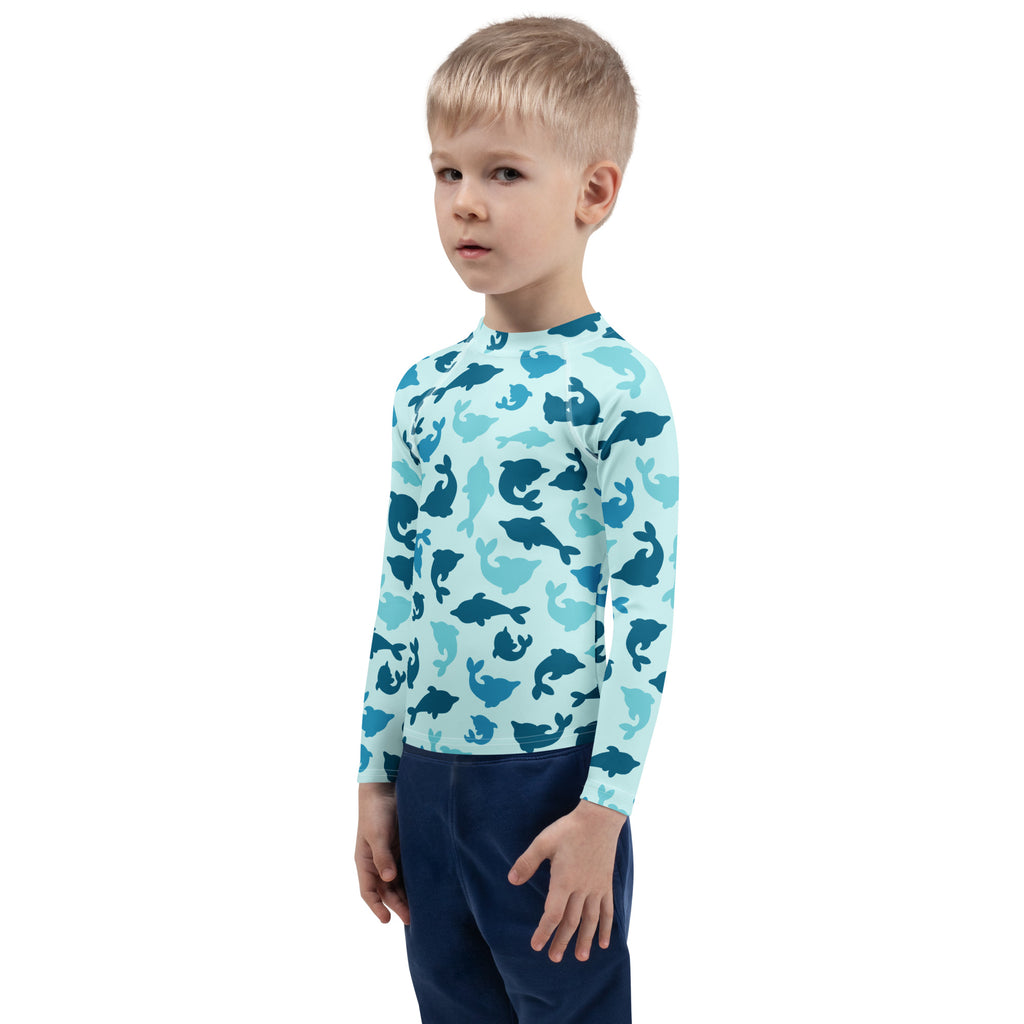 Childs light blue long sleeve rash guard with darker blue teal whale pattern upf 50+ swim shirt for kids