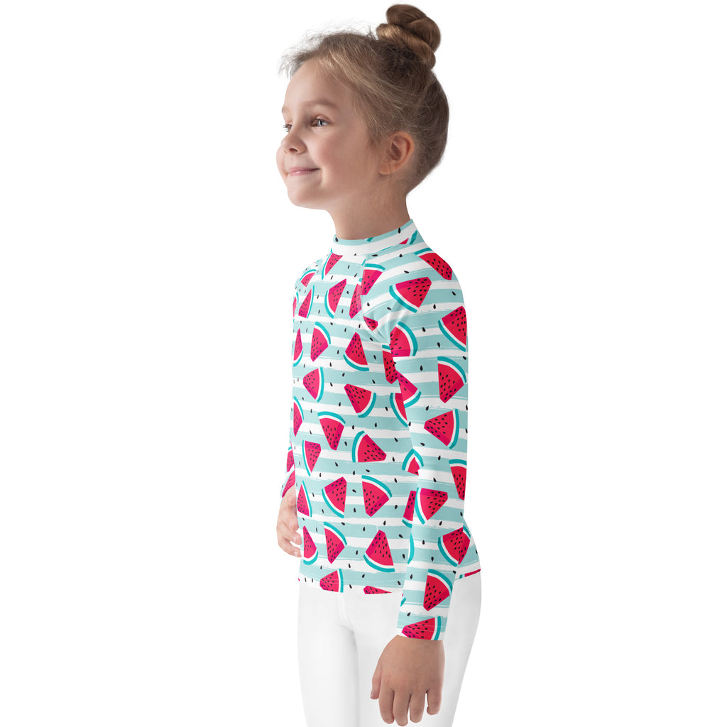 A child wearing a kids striped watermelon long sleeve rash guard swim shirt with UPF 50 plus in light blue and white
