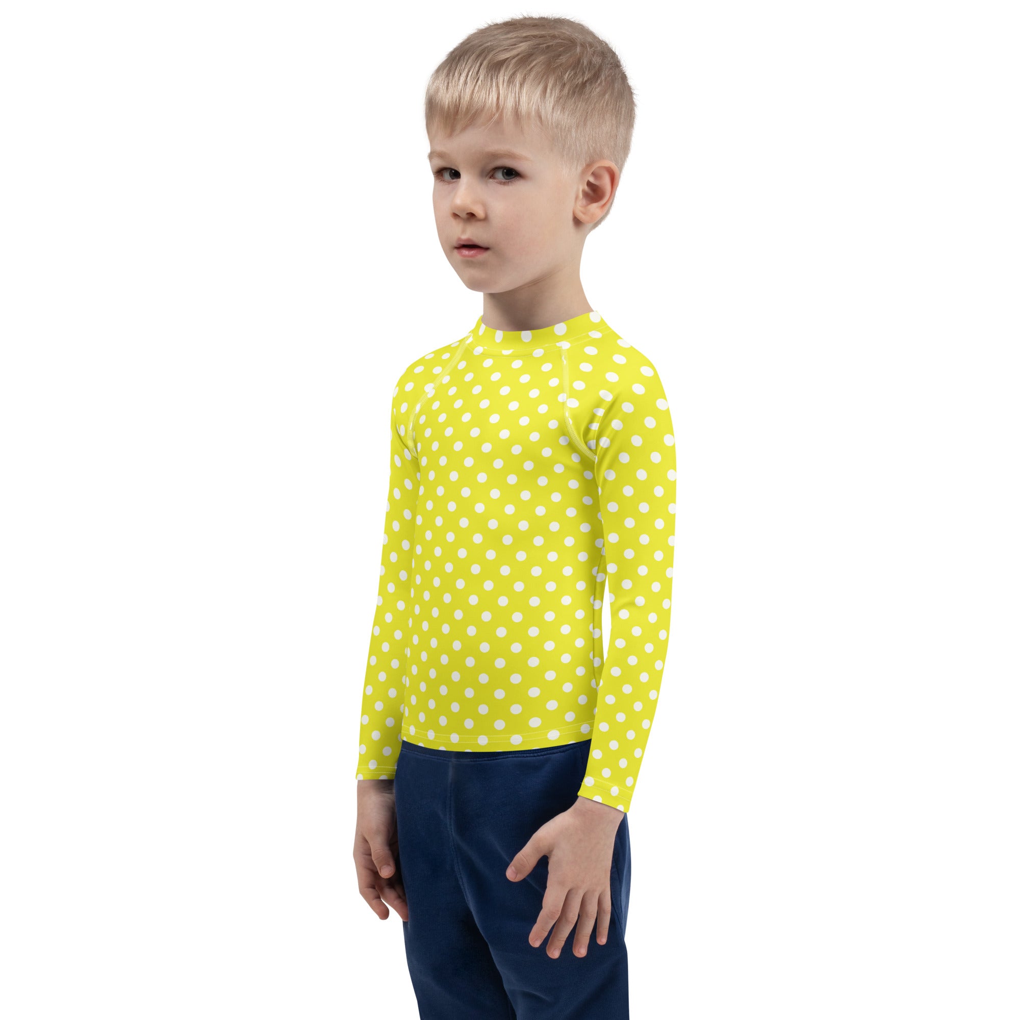 Kids yellow long sleeve rash guard swim shirt with white polka dots and UPF 50 plus for sun protection