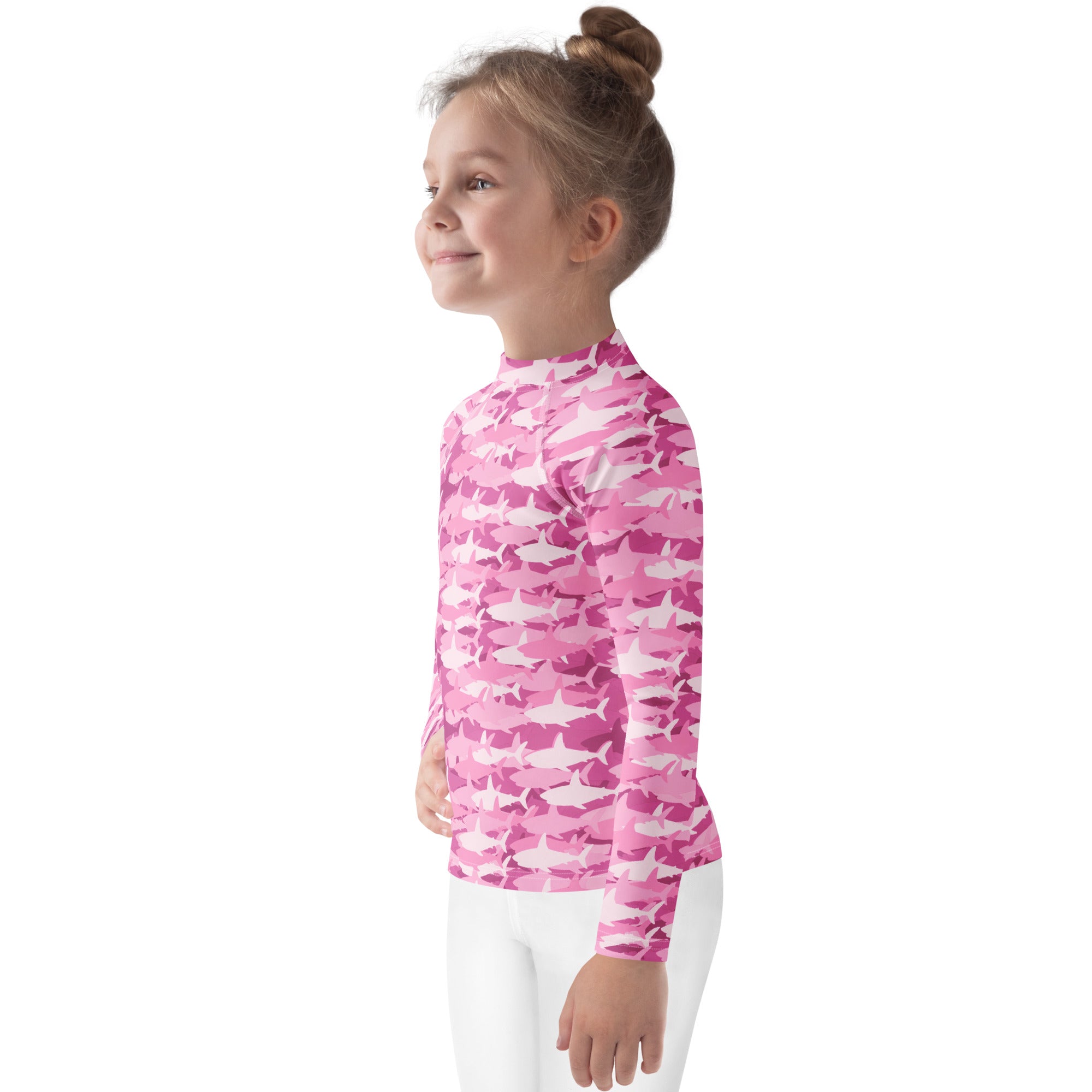 Girls pink and white shark camouflage long sleeve rash guard swim shirt with UPF 50 plus for sun protection