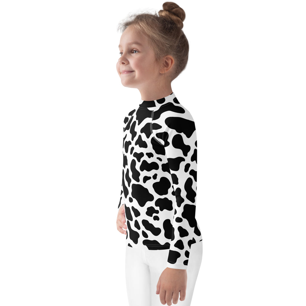 Kids cow print long sleeve rash guard swim shirt in black and white with upf 50 plus for sun protection
