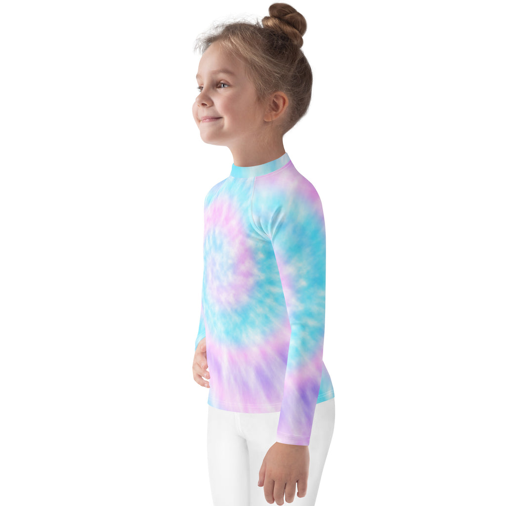 A child wearing a girl tie dye long sleeve rash guard swim shirt with upf 50 plus in blue pink and purple