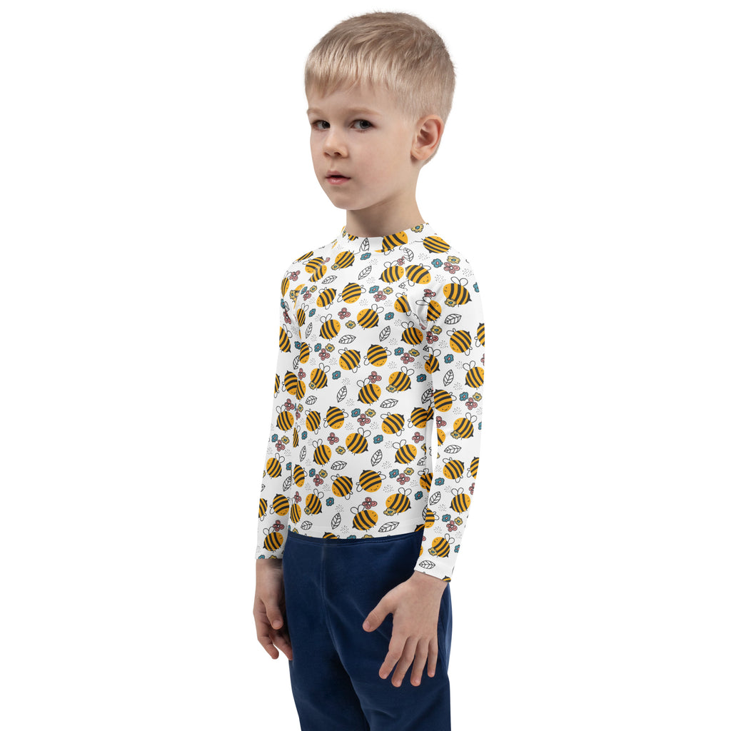 Kids floral yellow bumblebee long sleeve rash guard swim shirt with upf 50 plus featuring playful bee and flower pattern