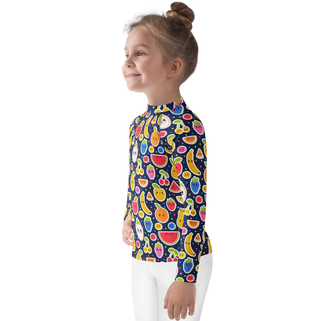 A child wearing a navy blue kids emoji fruit long sleeve rash guard swim shirt with UPF 50 plus protection