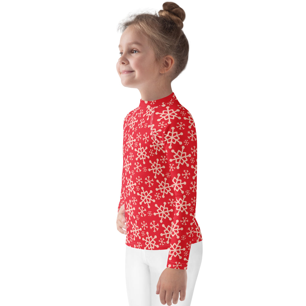 Kids red snowflake long sleeve rash guard swim shirt with upf 50 plus featuring white snowflake pattern