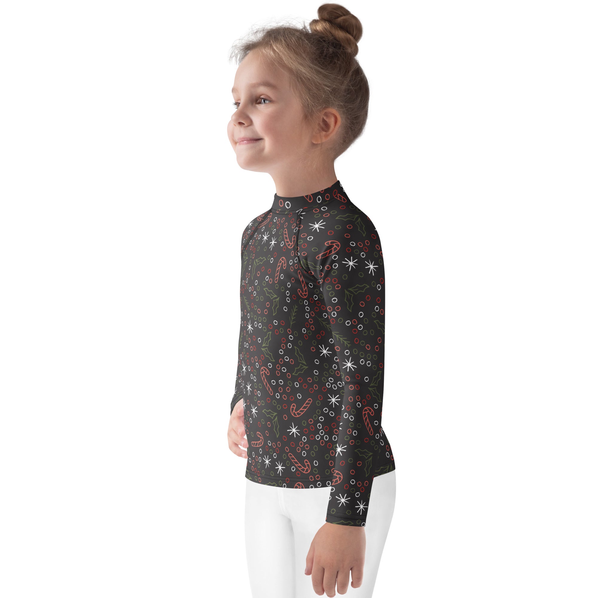 Black long sleeve rash guard swim shirt for kids with festive candy cane holly pattern and upf 50 plus protection
