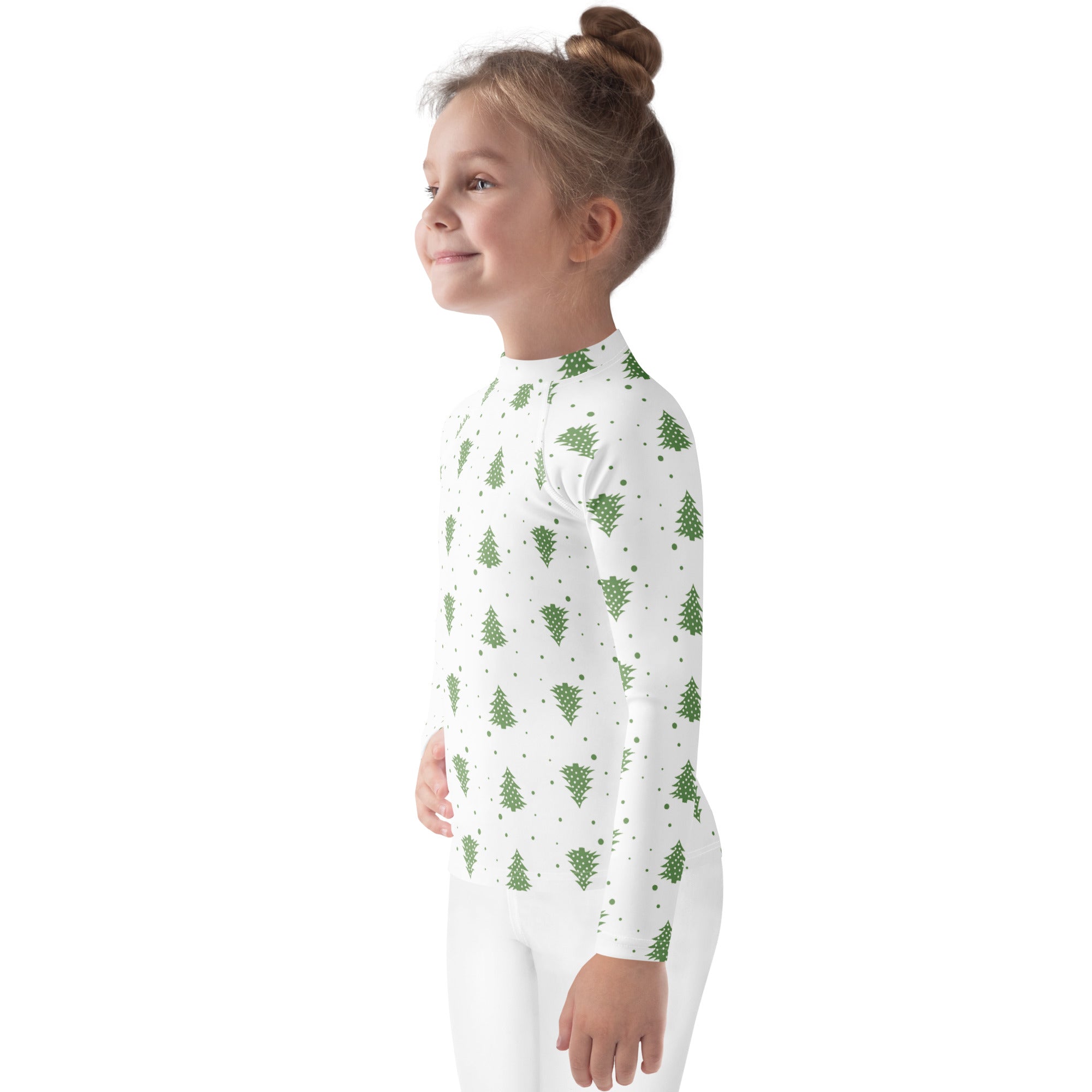 White long-sleeved kids rash guard swim shirt with green pine tree pattern and UPF 50 plus sun protection