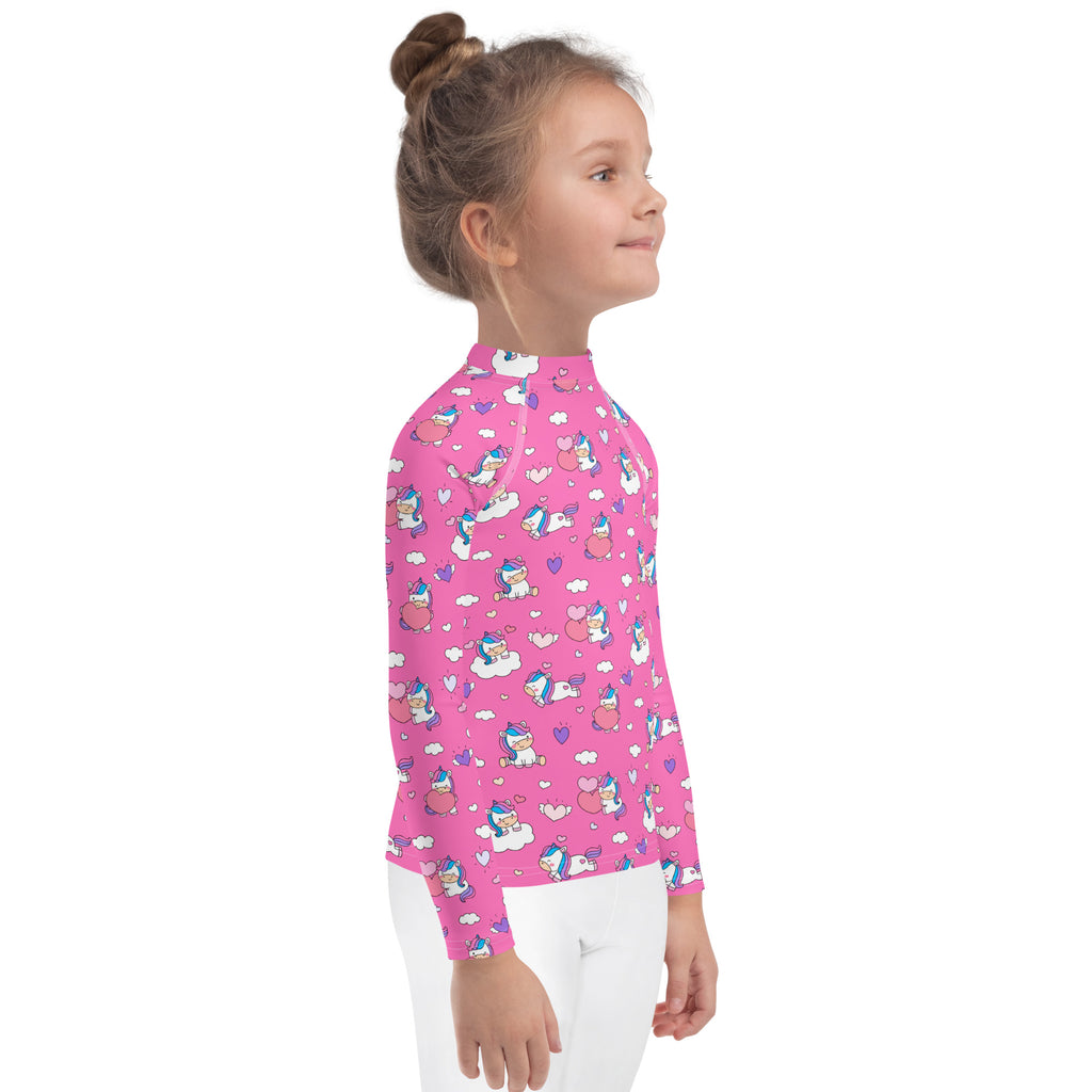 Pink long sleeve rash guard for girls with playful unicorn hearts and clouds pattern and upf 50 plus protection