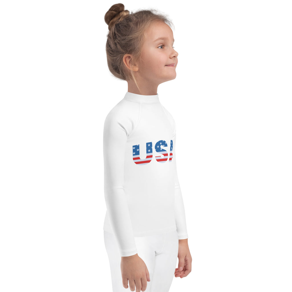 White long-sleeved kids usa rash guard swim shirt with red white and blue flag print and upf 50+ sun protection