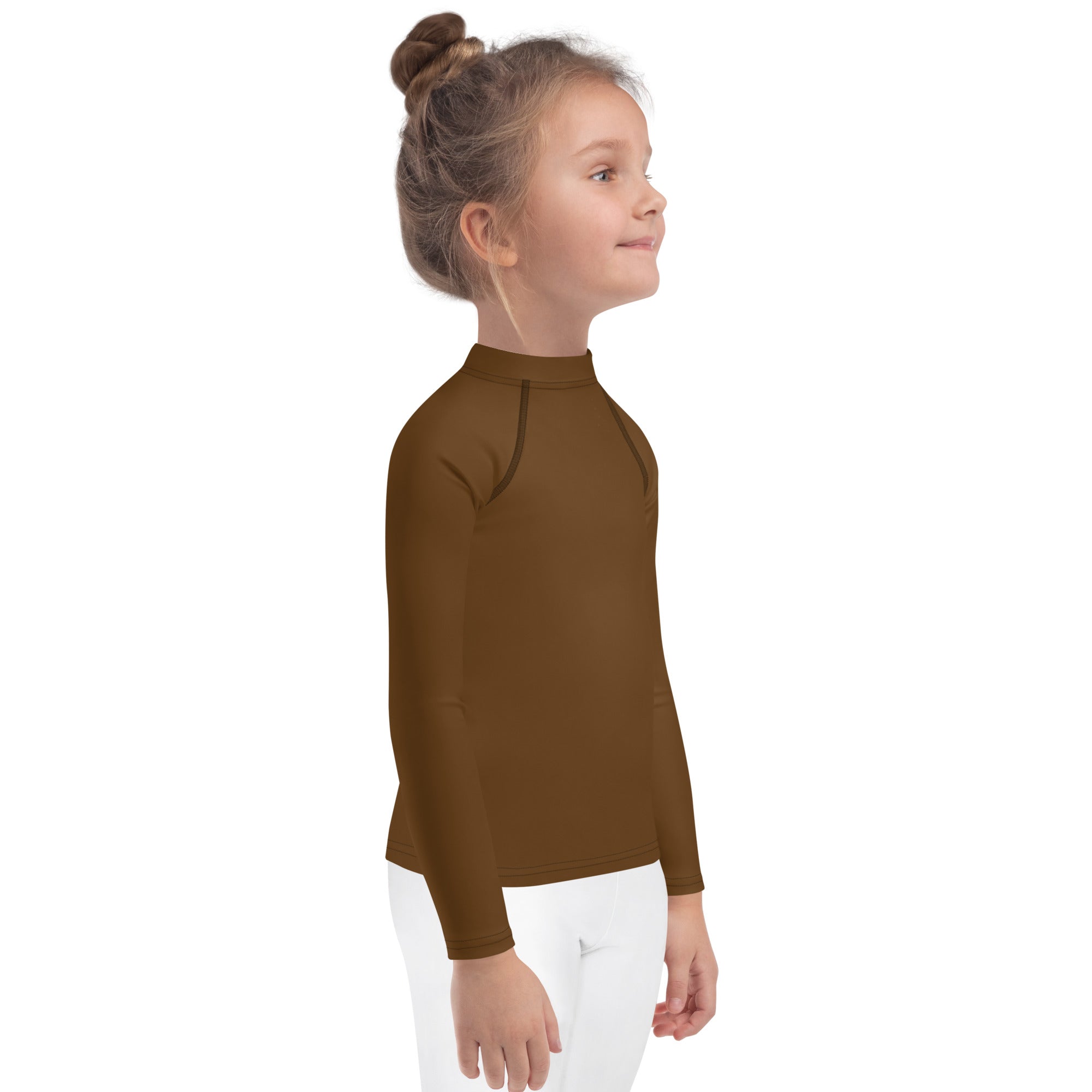 A child wearing a kids brown long sleeve rash guard swim shirt with UPF 50 high collar and subtle seam detailing