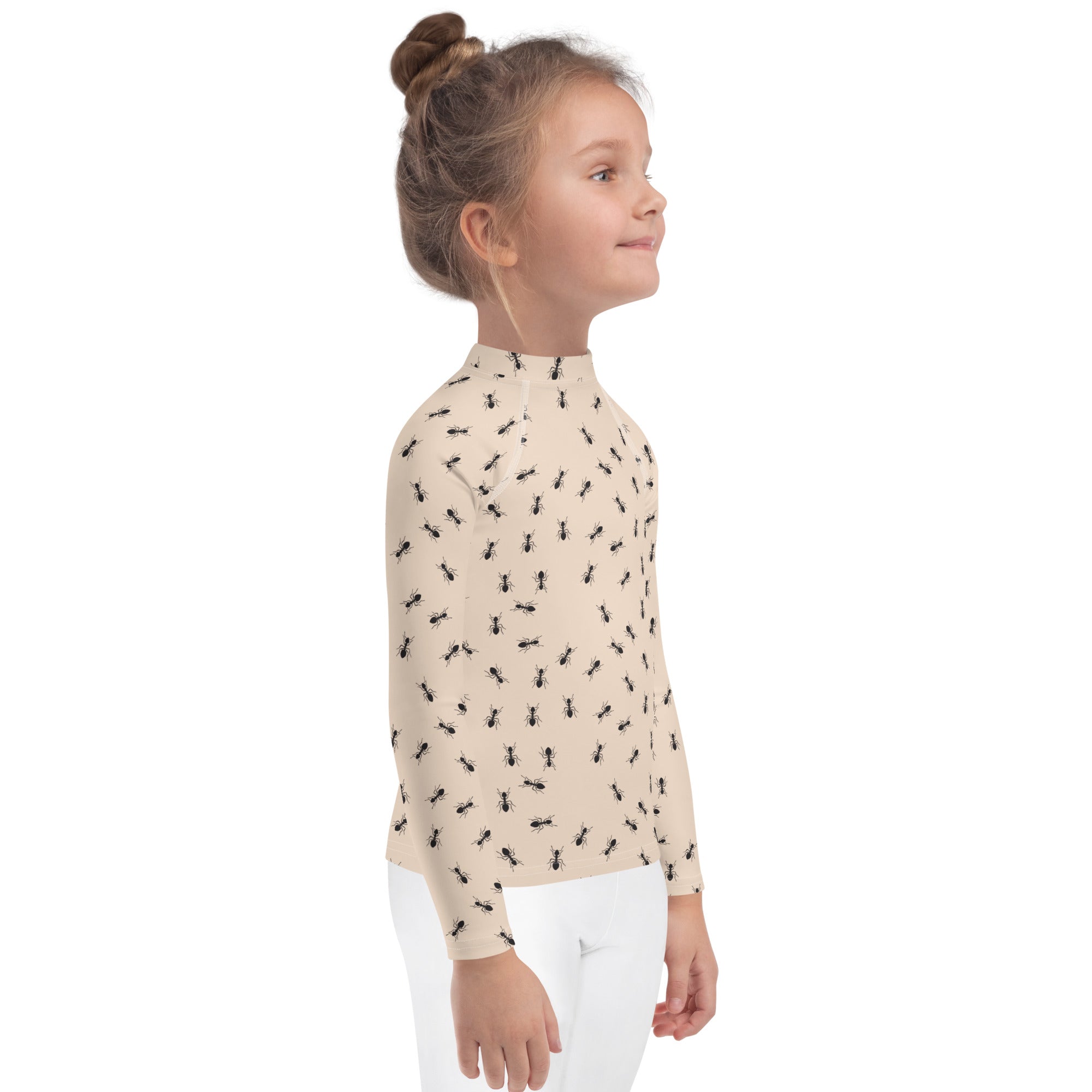 Beige kids long sleeve rash guard swim shirt with black ant pattern and UPF 50 plus sun protection