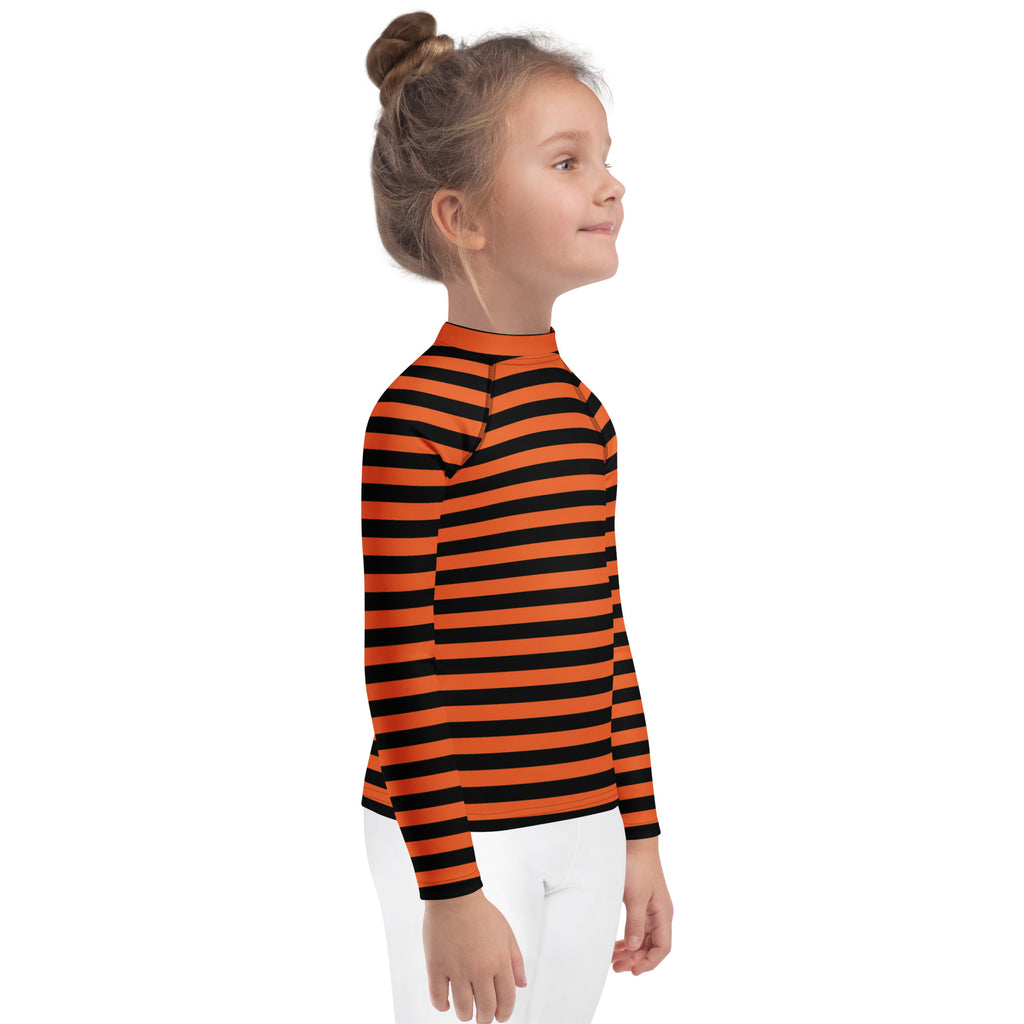 Kids orange and black halloween long sleeve rash guard swim shirt with upf 50 plus featuring bold stripes