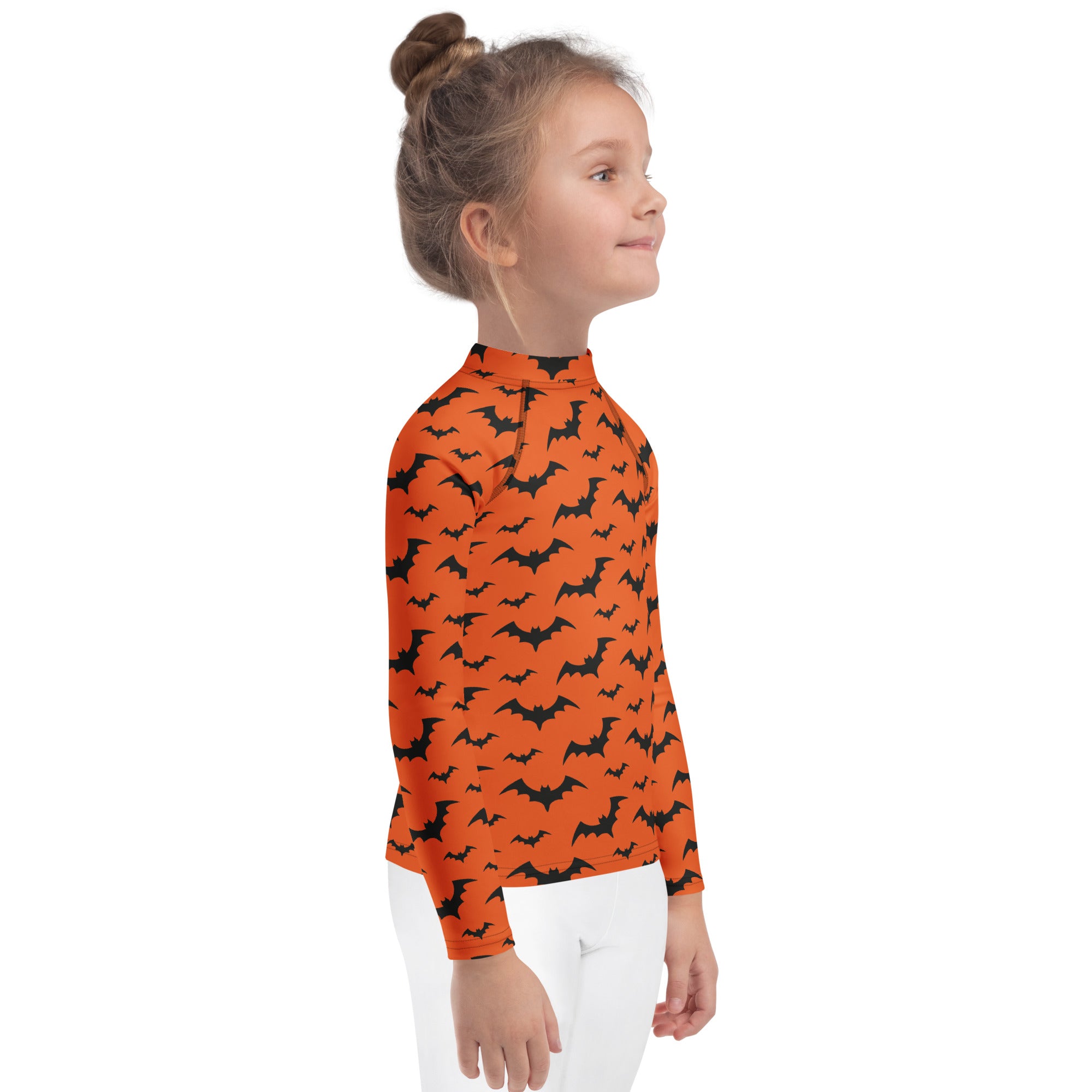 Kids orange long sleeve rash guard swim shirt with black bat pattern and upf 50 plus for halloween protection