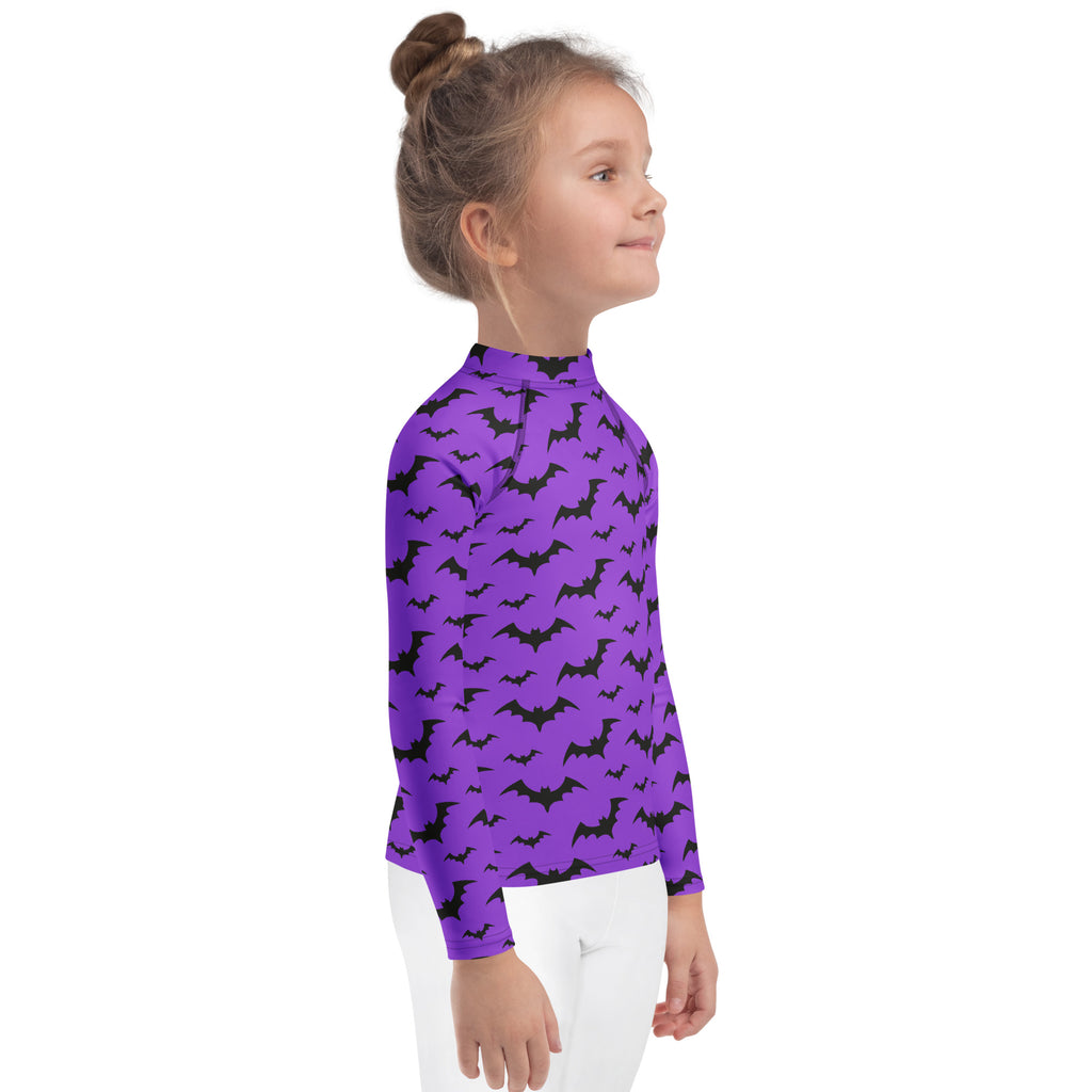 Kids purple bats halloween long sleeve rash guard swim shirt with upf 50 plus featuring black bat pattern