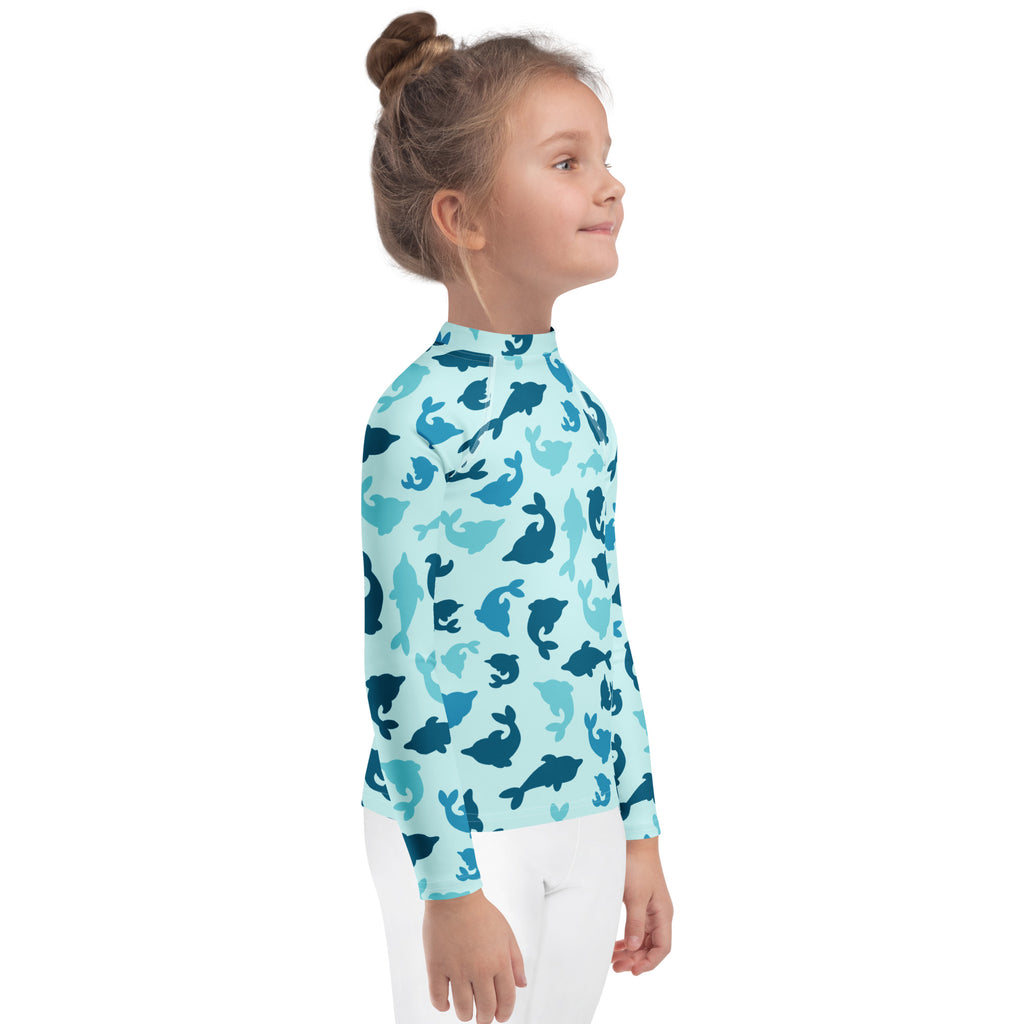 Kids blue dolphin long sleeve rash guard swim shirt with upf 50 plus featuring playful dark blue dolphin silhouettes pattern