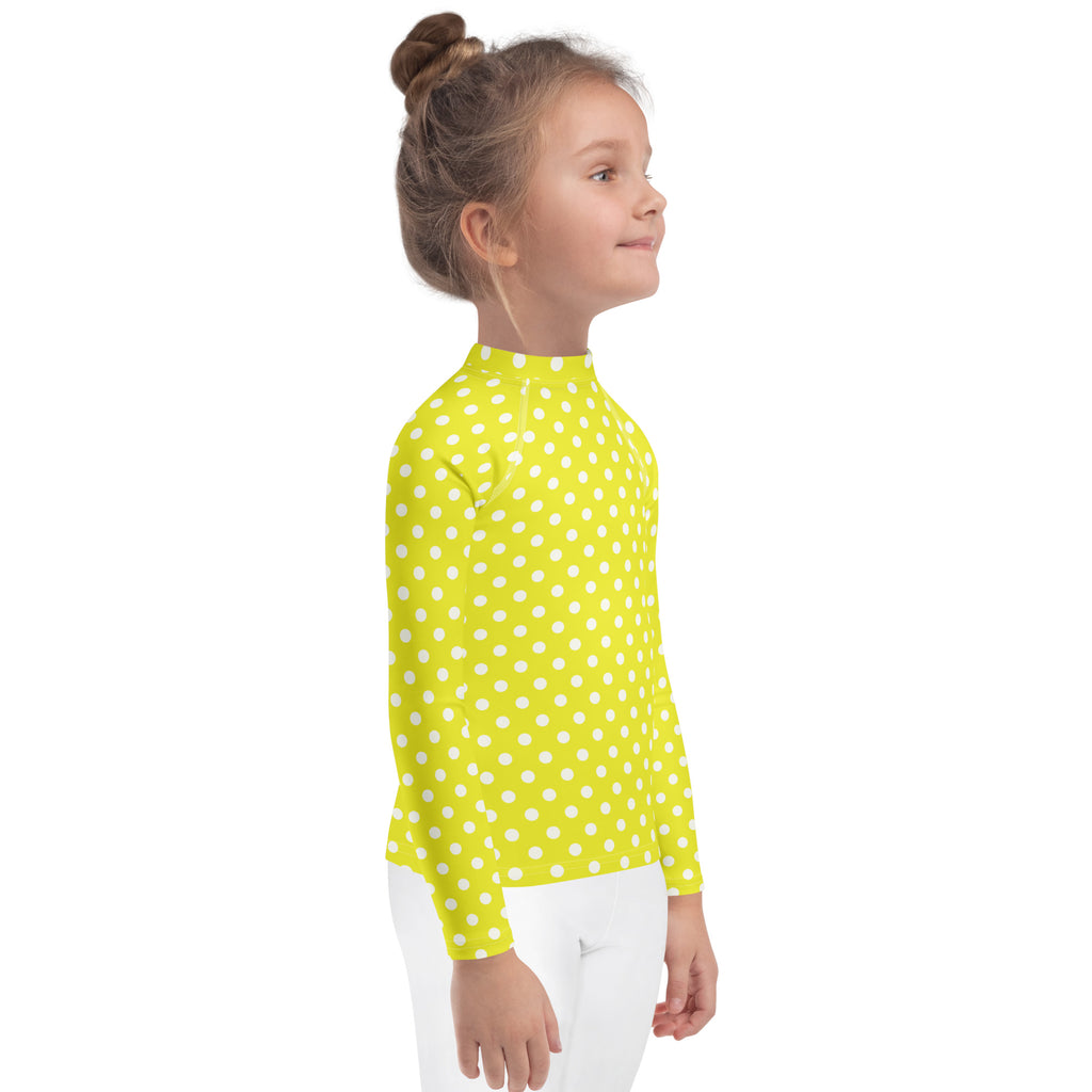 Kids yellow polka dots long sleeve rash guard swim shirt with upf 50 bright lime green with white polka dots front view