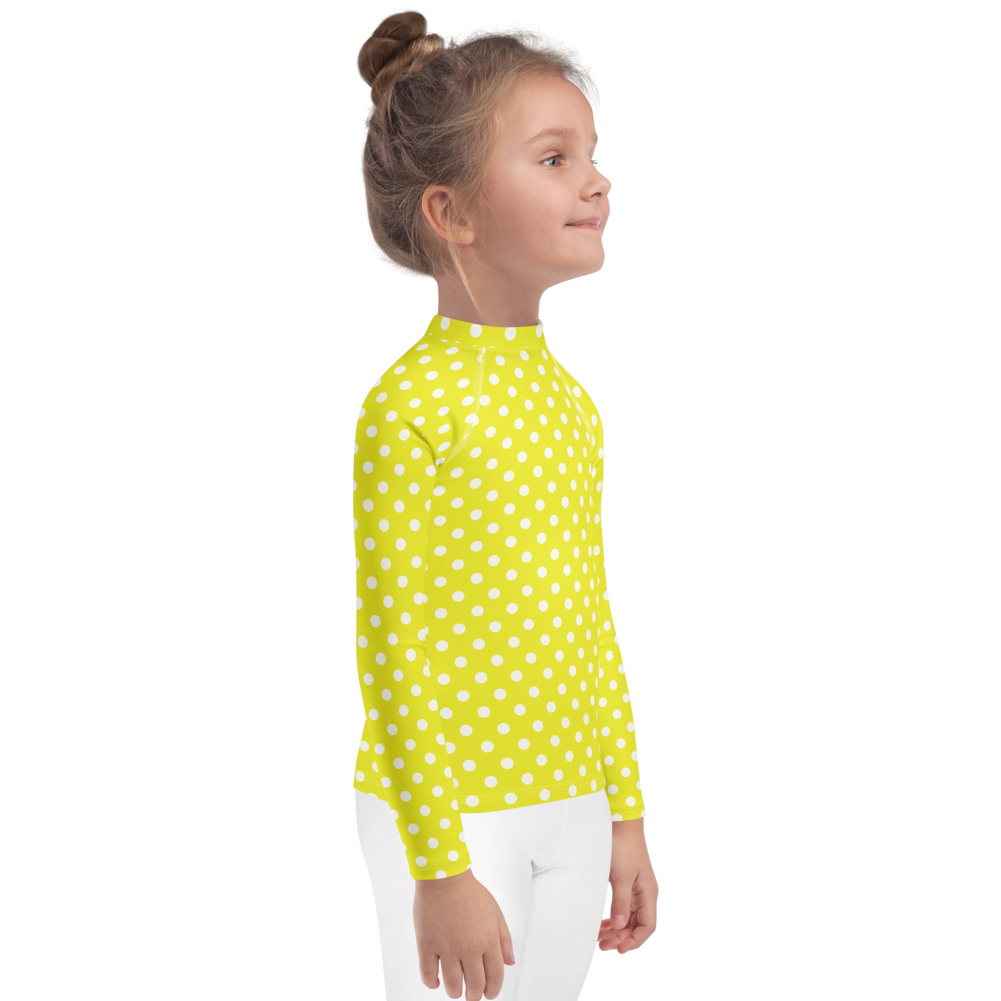 Kids yellow polka dots long sleeve rash guard swim shirt with upf 50 bright lime green with white polka dots front view