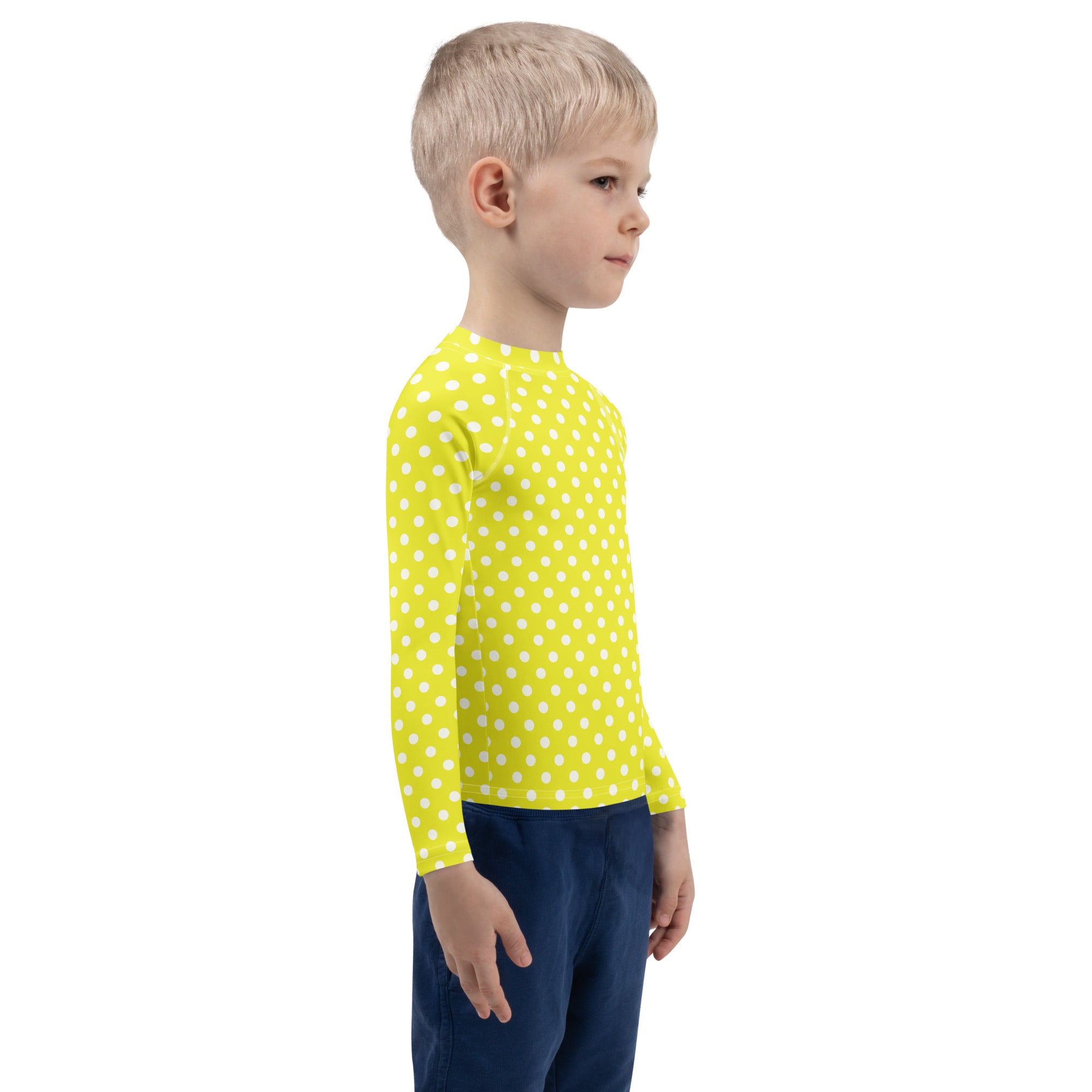 Kids yellow long sleeve rash guard swim shirt with white polka dots and UPF 50 plus for sun protection