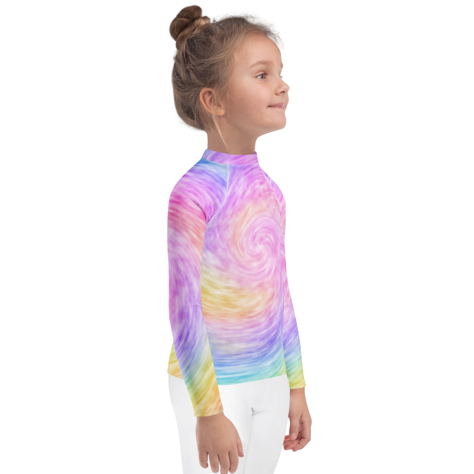 A child wearing a kids rainbow tie dye long sleeve rash guard swim shirt with pastel swirl pattern and UPF 50+ protection