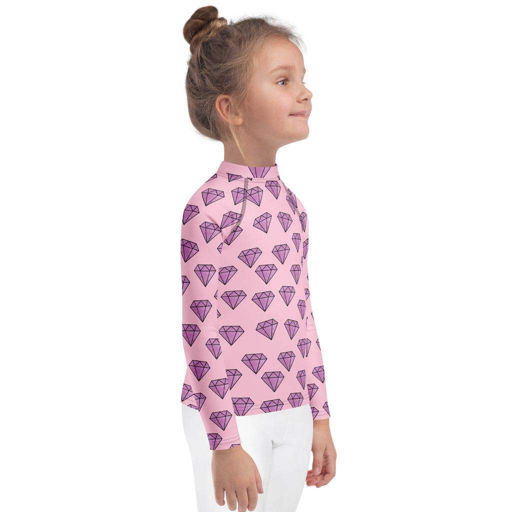 Girls purple diamonds long sleeve rash guard swim shirt in pink with a purple diamond pattern and UPF 50 plus protection