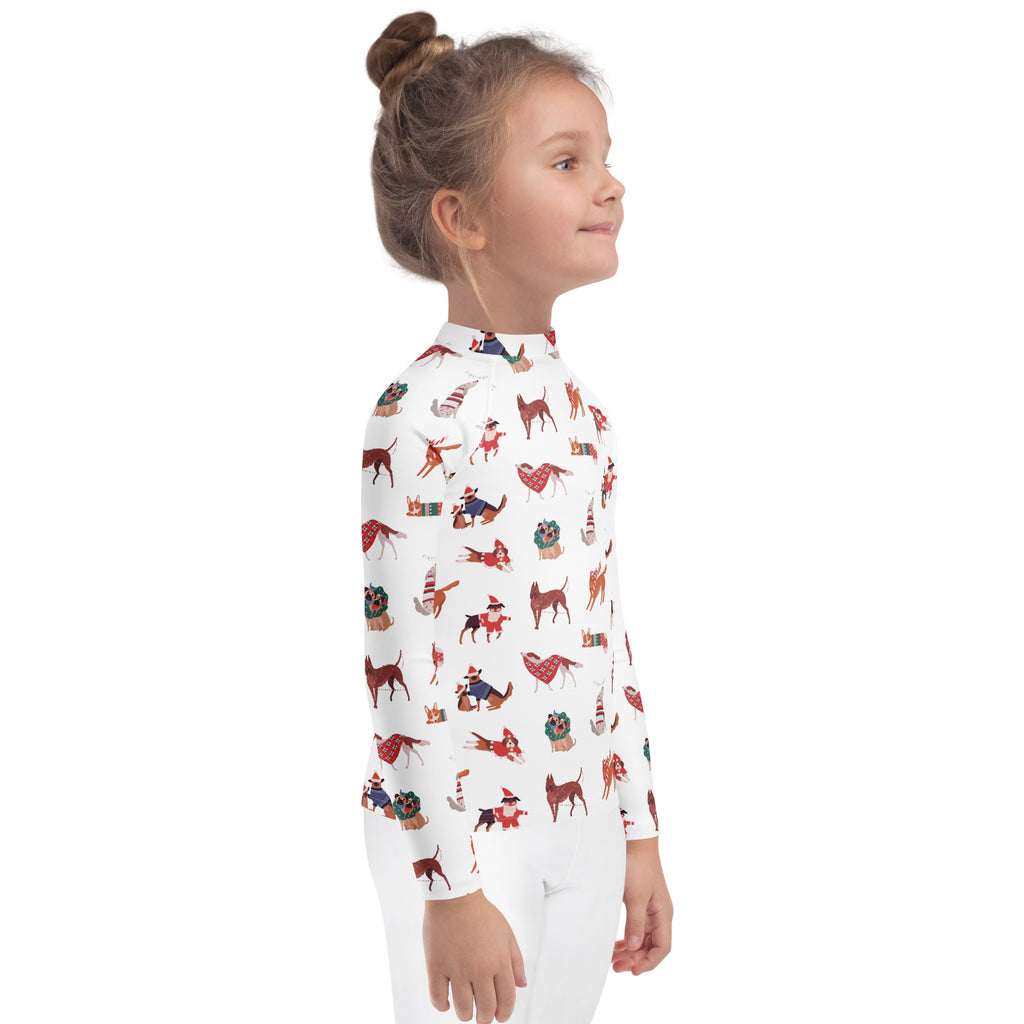 White long-sleeved kids rash guard swim shirt with upf 50 and festive cartoon dogs holiday pattern